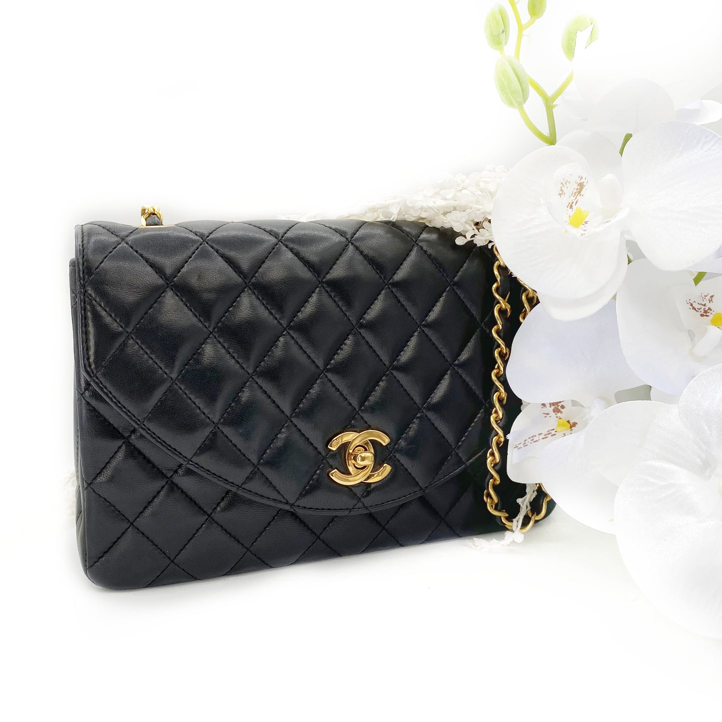 Julio, Vintage Authentic Chanel 1 series matelasse half moon chain black lambskin with seal and card