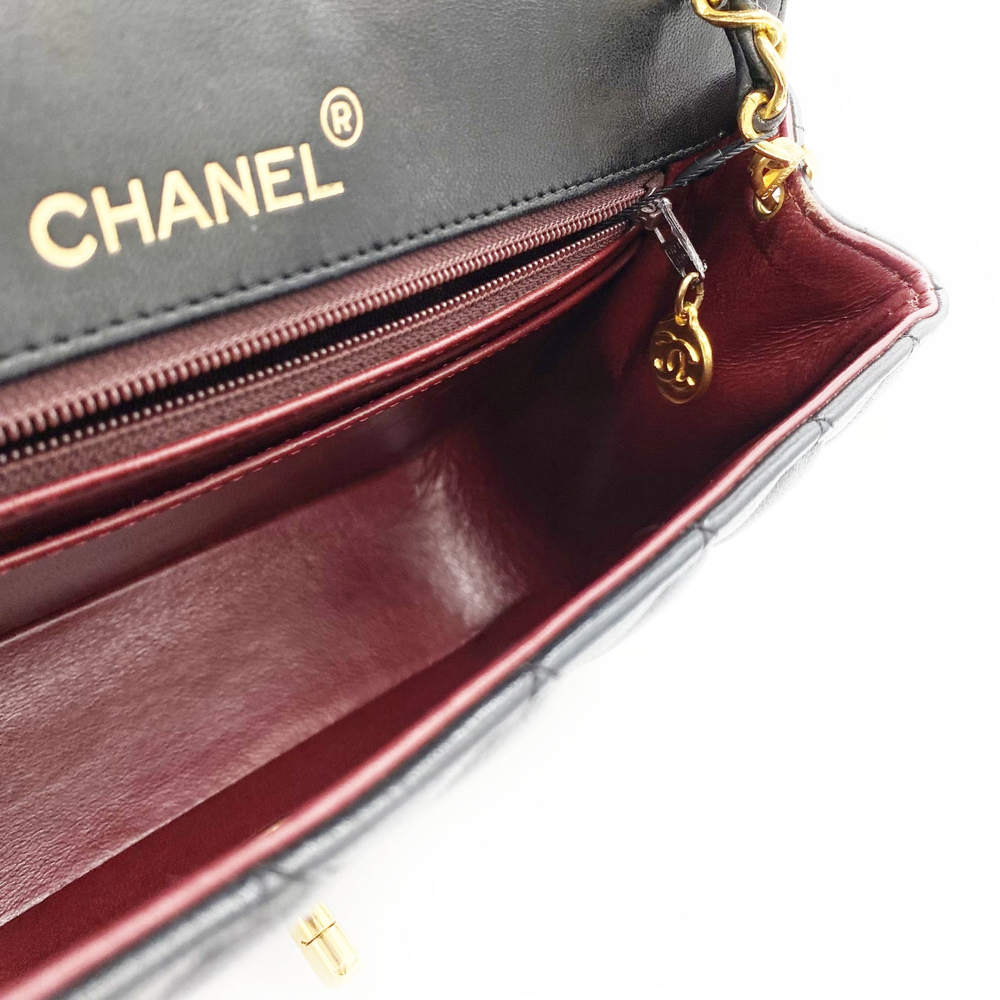 Julio, Vintage Authentic Chanel 1 series matelasse half moon chain black lambskin with seal and card