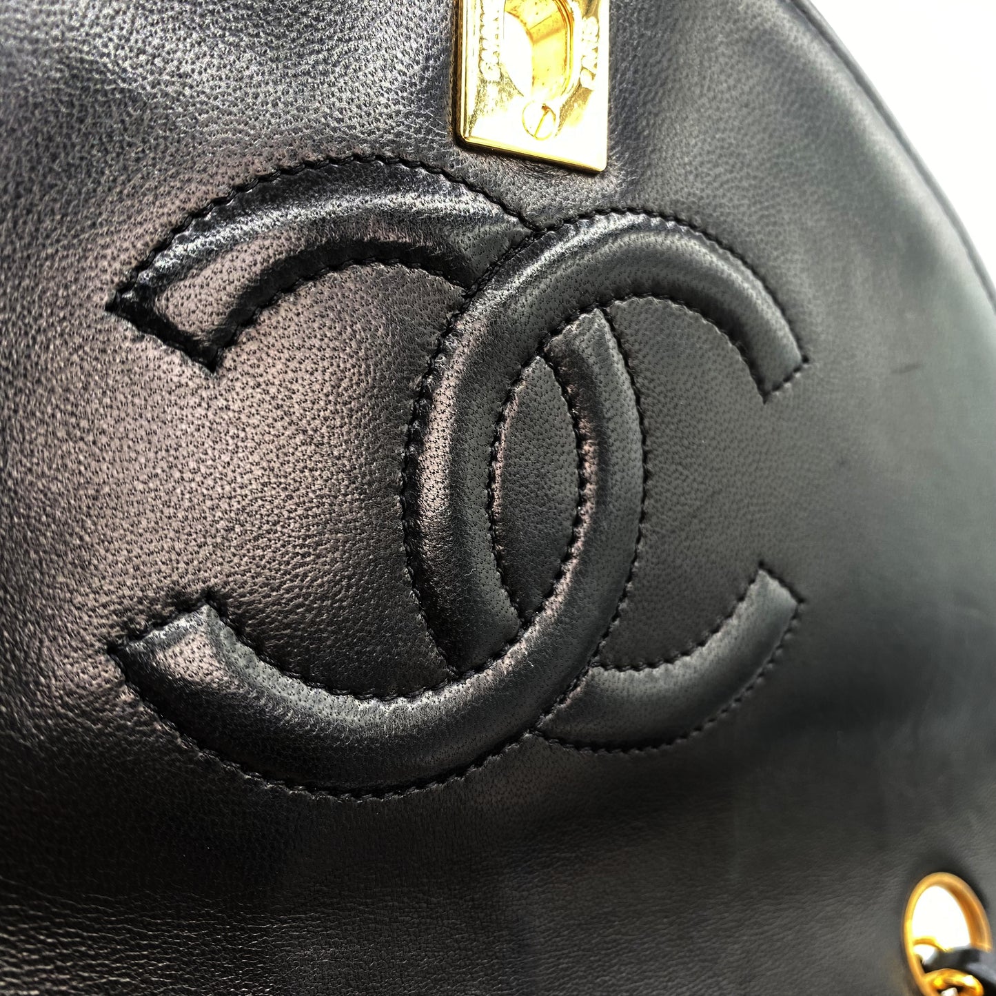 Julio, Vintage Authentic Chanel 1 series matelasse half moon chain black lambskin with seal and card