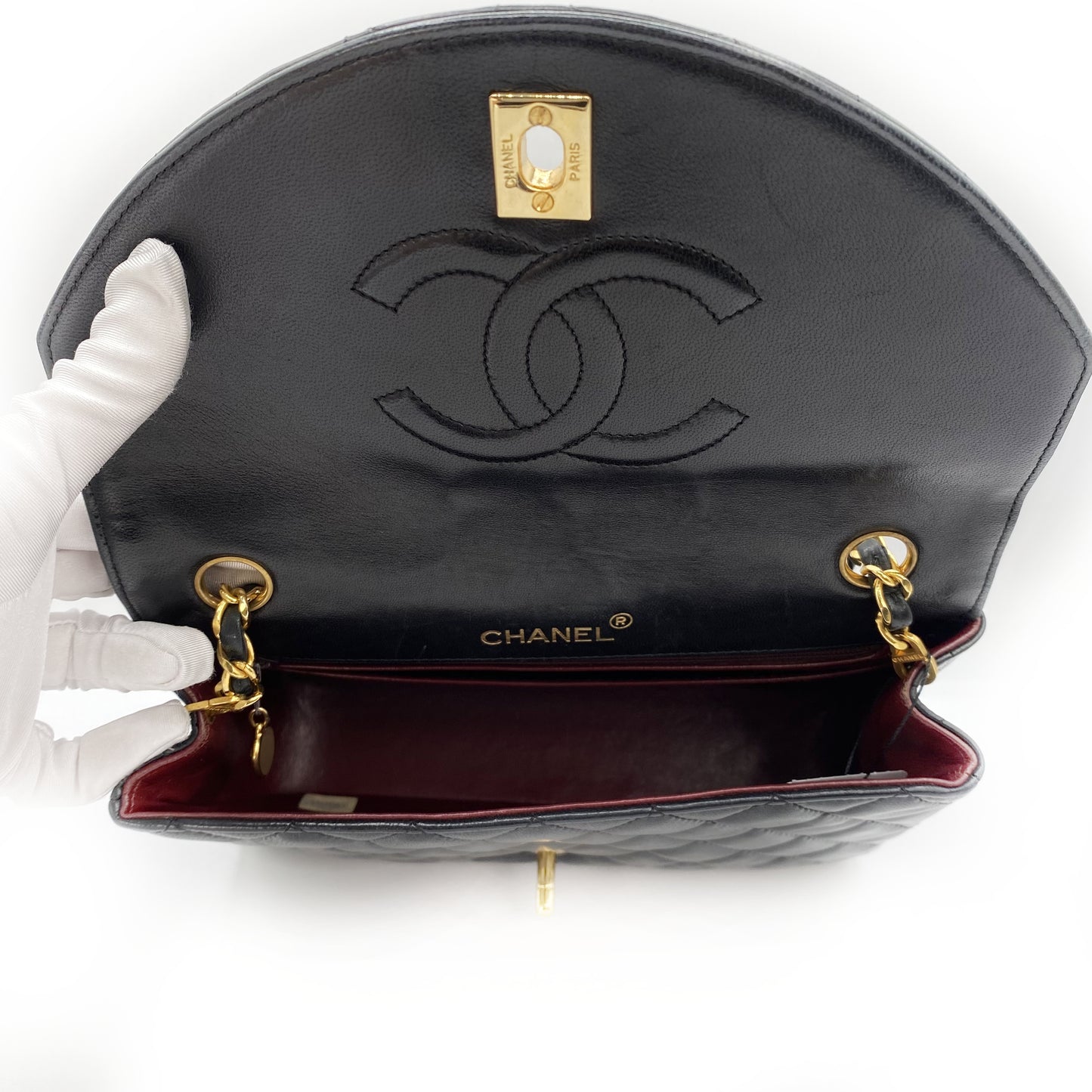 Julio, Vintage Authentic Chanel 1 series matelasse half moon chain black lambskin with seal and card
