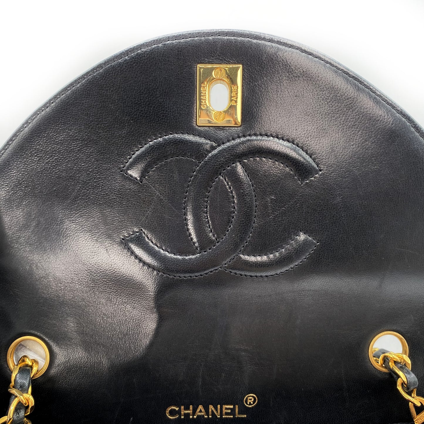 Julio, Vintage Authentic Chanel 1 series matelasse half moon chain black lambskin with seal and card