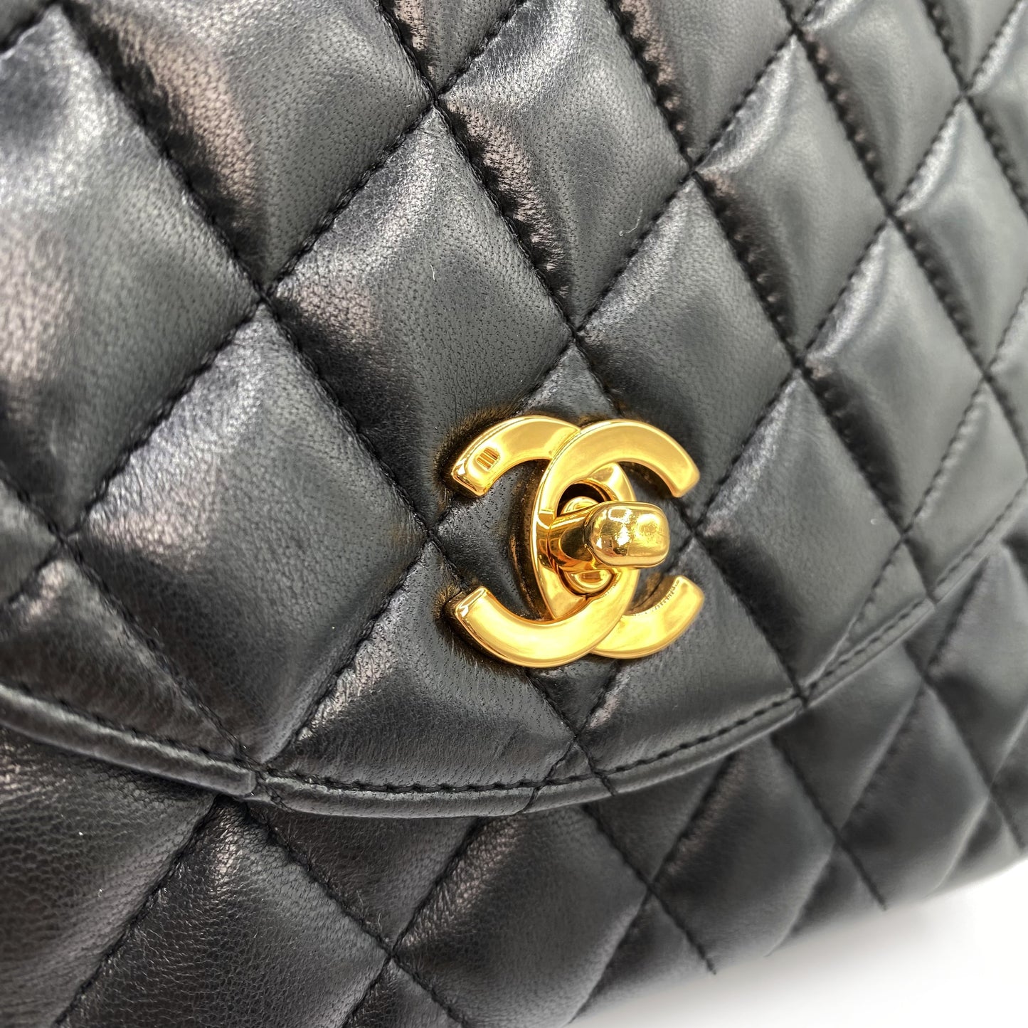 Julio, Vintage Authentic Chanel 1 series matelasse half moon chain black lambskin with seal and card