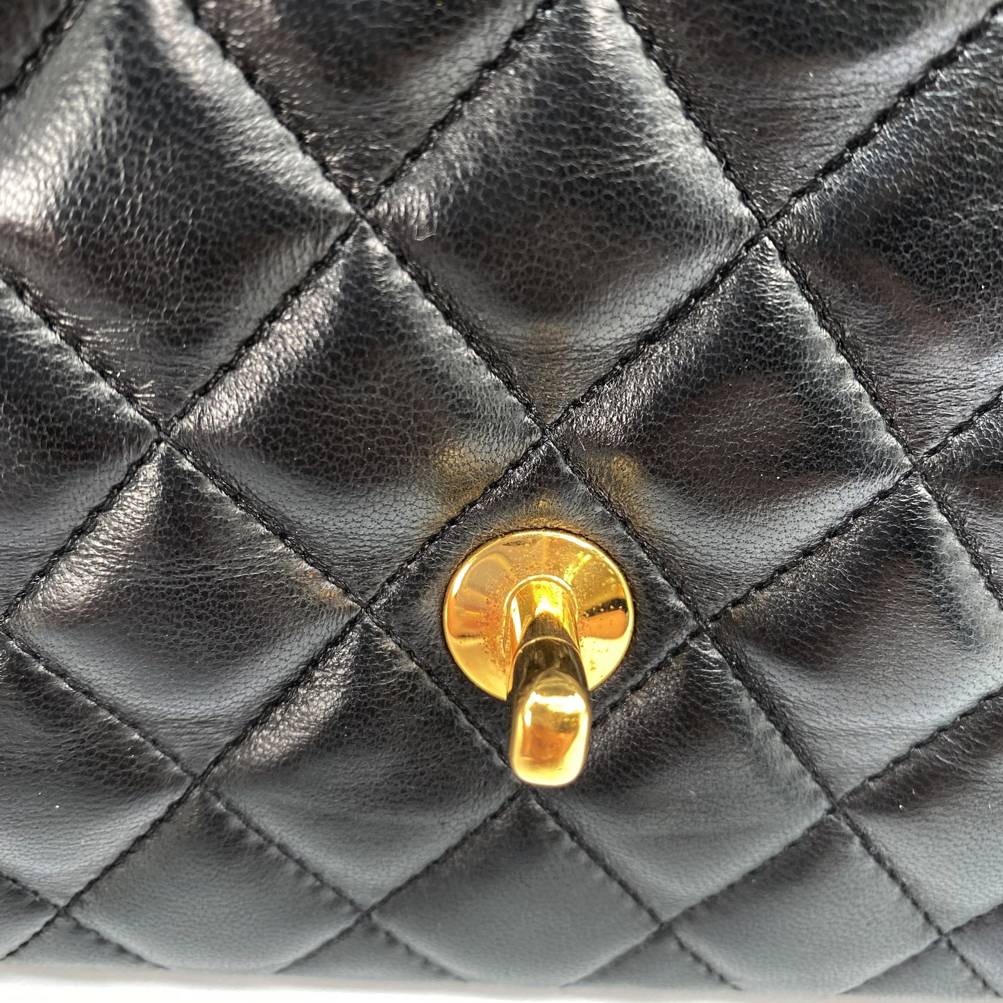 Julio, Vintage Authentic Chanel 1 series matelasse half moon chain black lambskin with seal and card