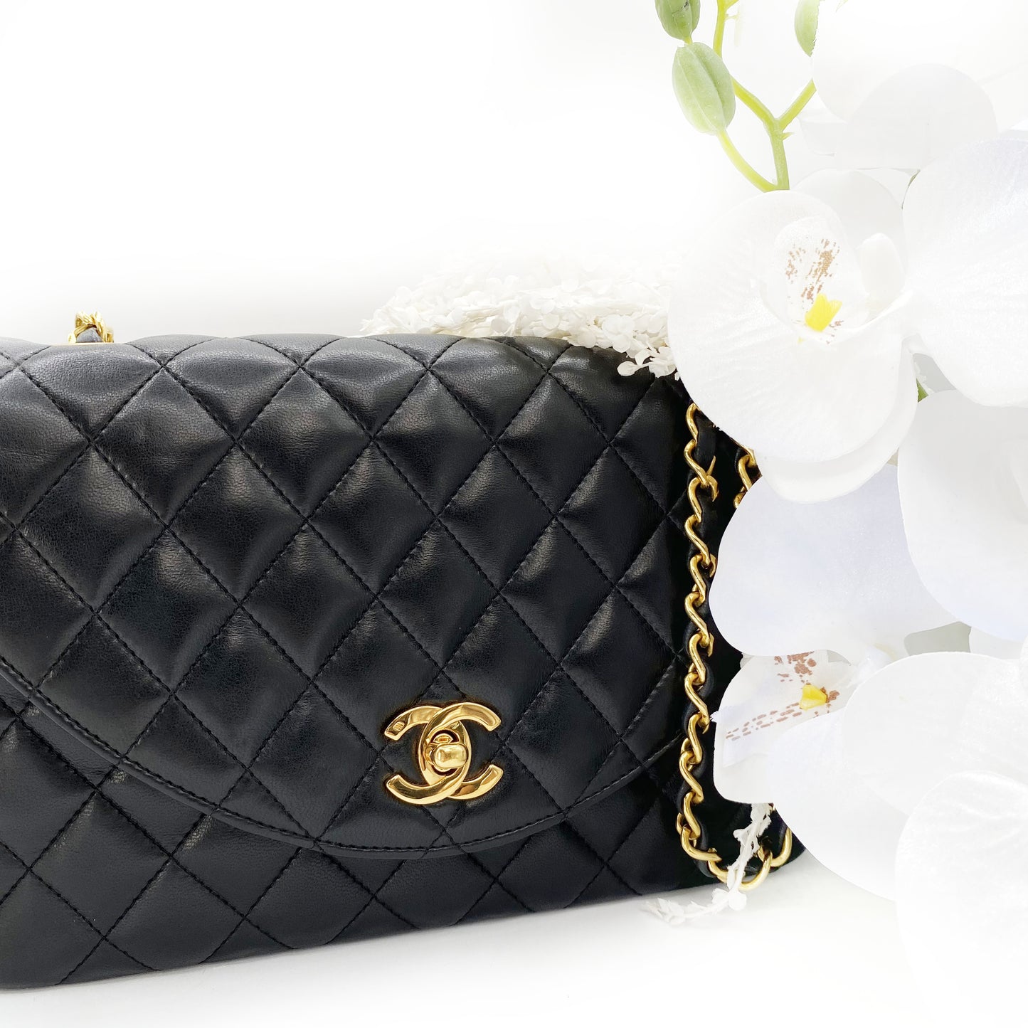 Julio, Vintage Authentic Chanel 1 series matelasse half moon chain black lambskin with seal and card
