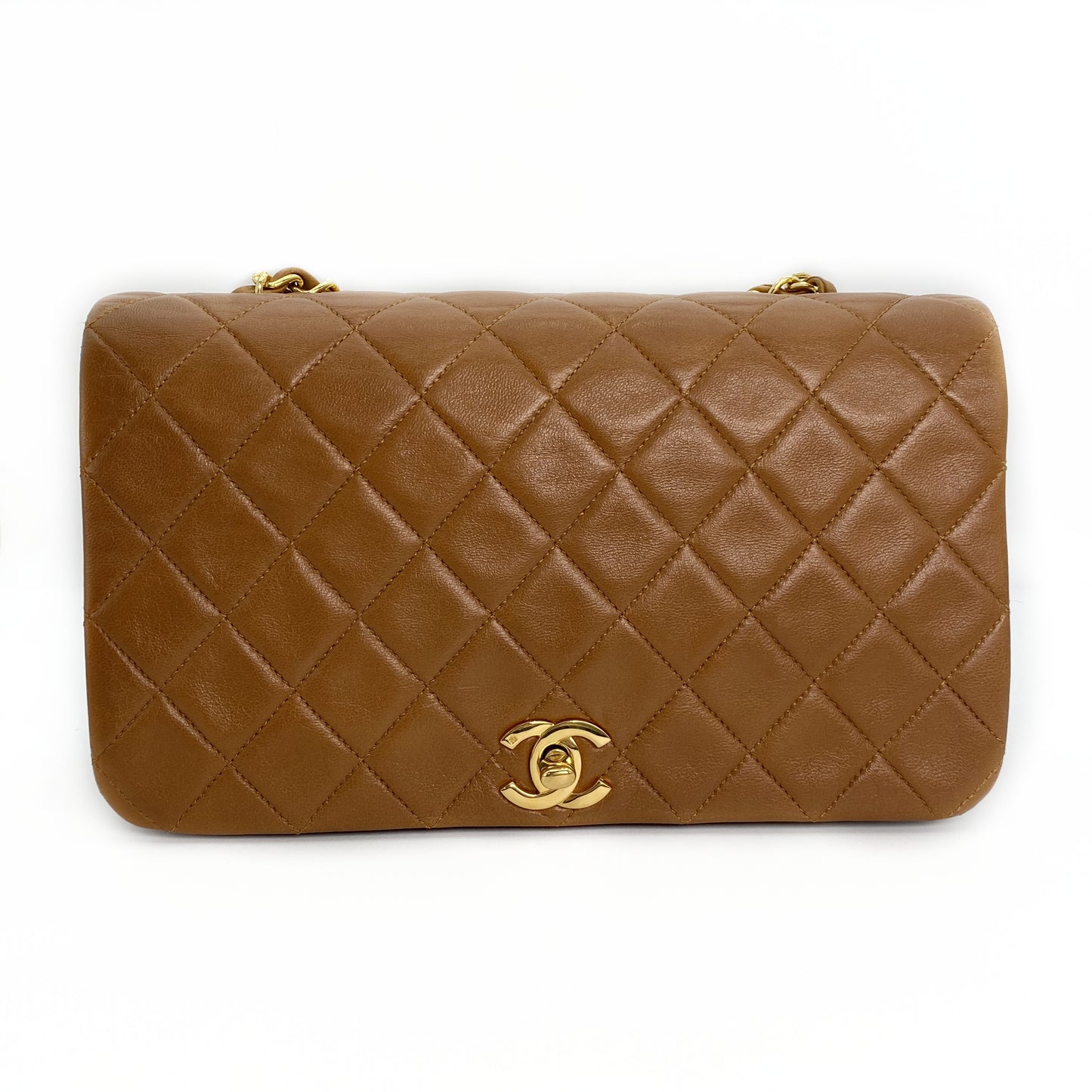 Reece Jr, Vintage Authentic Chanel 1 series full flap chain brown lambskin with seal and card