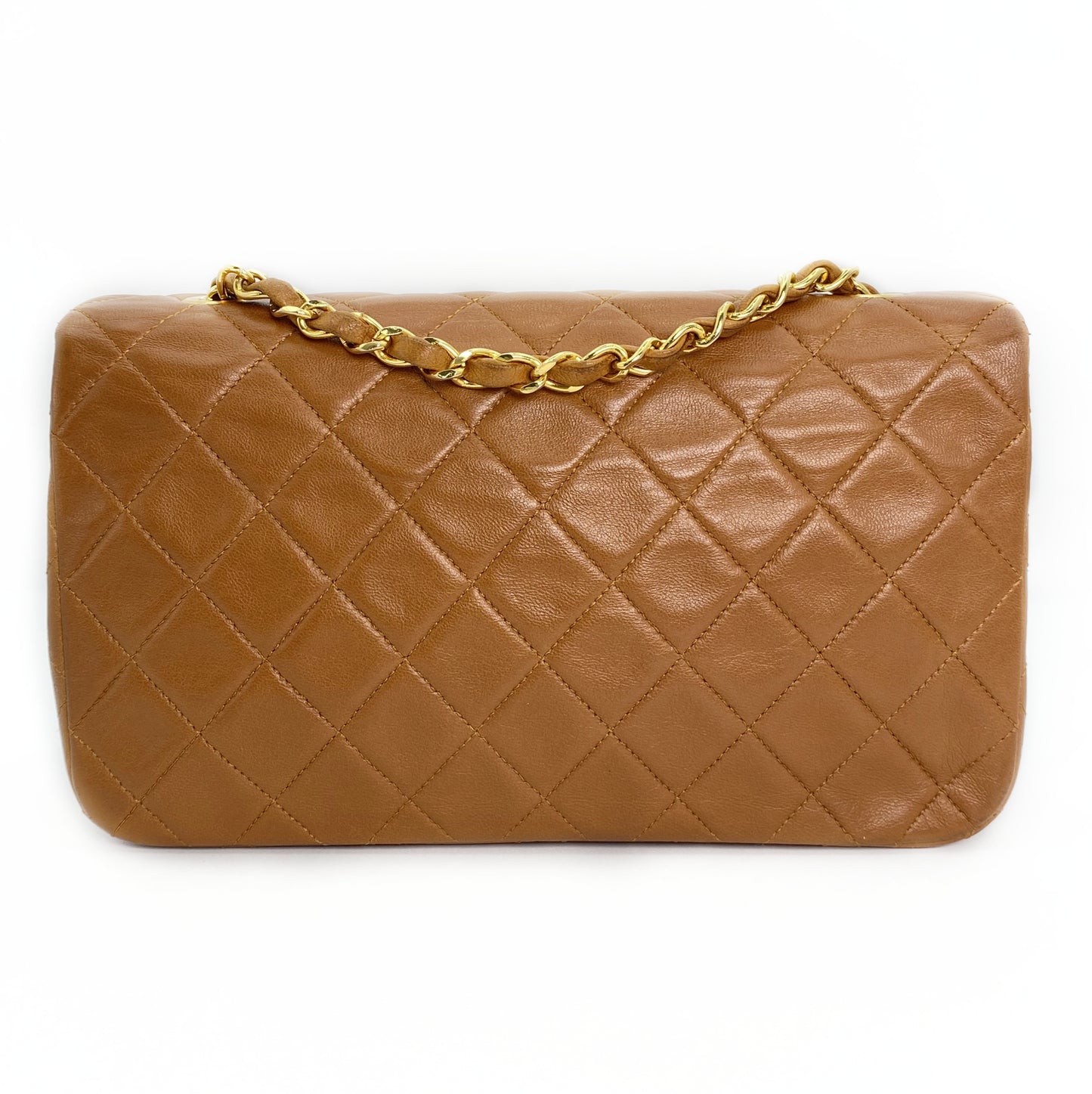 Reece Jr, Vintage Authentic Chanel 1 series full flap chain brown lambskin with seal and card
