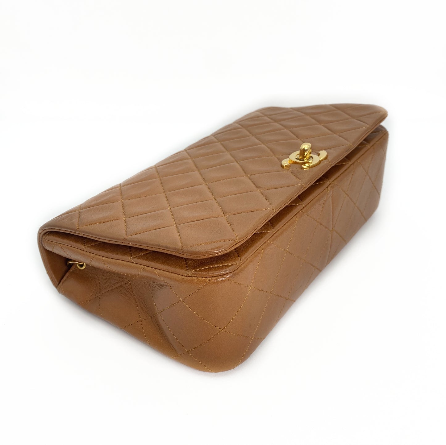 Reece Jr, Vintage Authentic Chanel 1 series full flap chain brown lambskin with seal and card