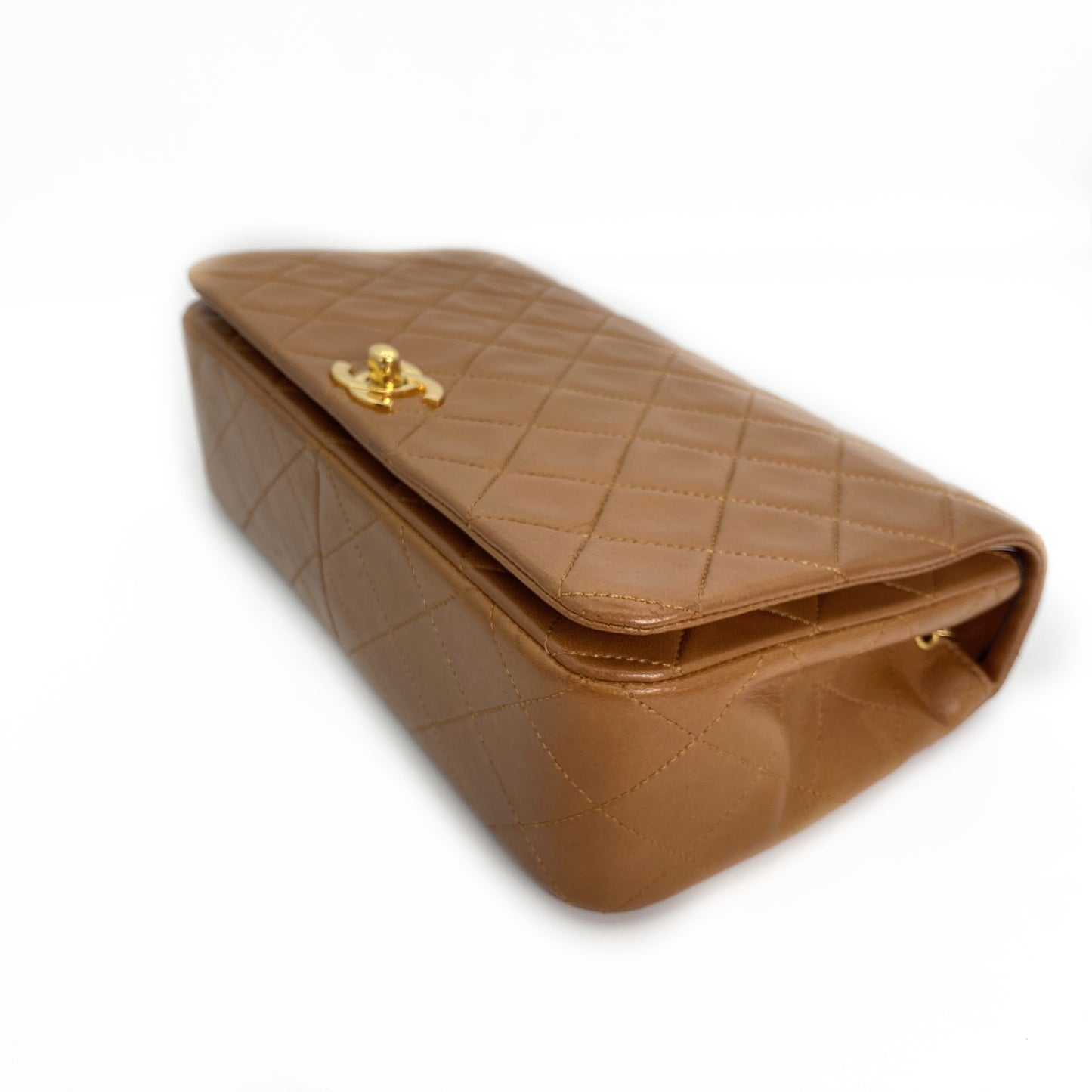 Reece Jr, Vintage Authentic Chanel 1 series full flap chain brown lambskin with seal and card
