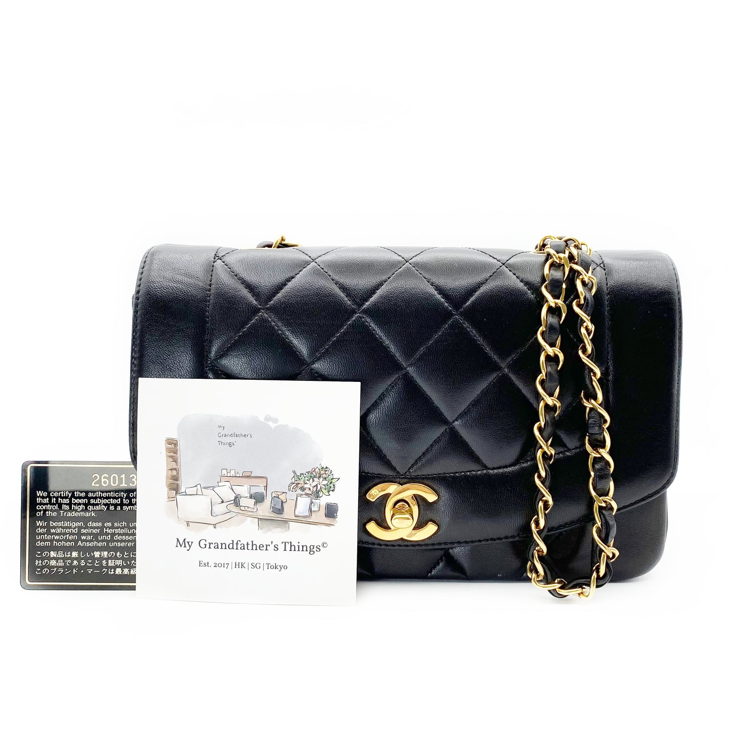 Theodoro, Vintage Authentic Chanel 2 series small black lambskin diana with seal and card