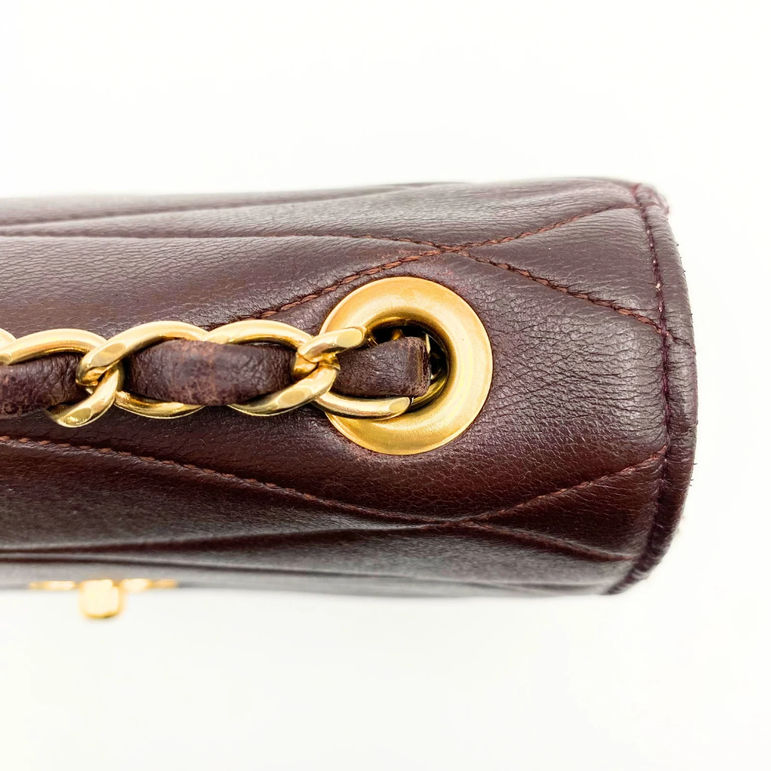 Kensley, Vintage Authentic Chanel 1 series chain brown lambskin with seal and card