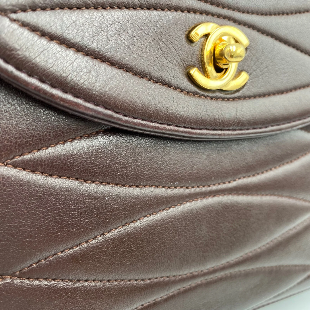 Kensley, Vintage Authentic Chanel 1 series chain brown lambskin with seal and card