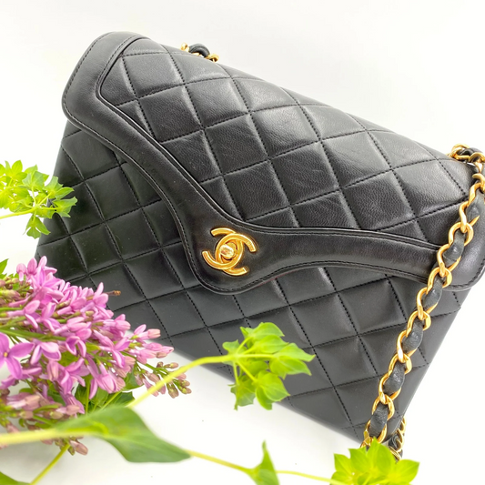 Marieta, 2 series vintage authentic Chanel black lambskin mini with seal only