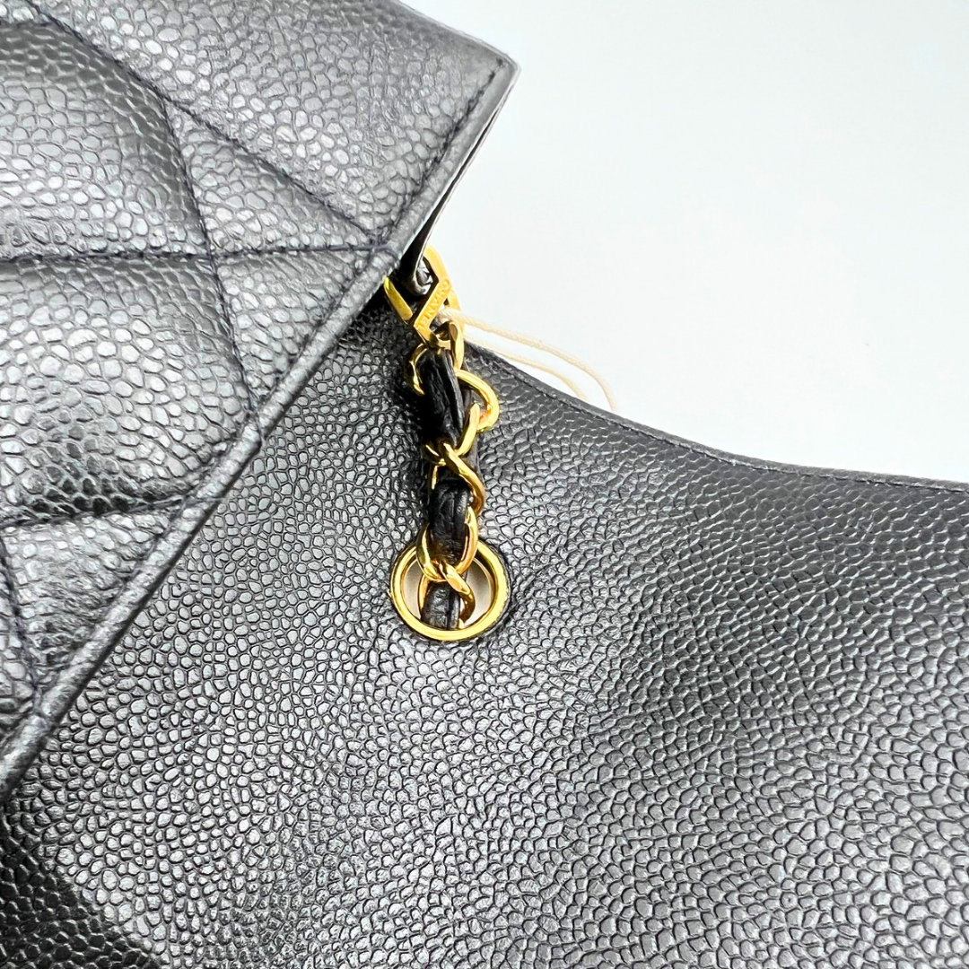 Adler, Vintage Authentic Chanel 3 series medium black caviar diana with seal