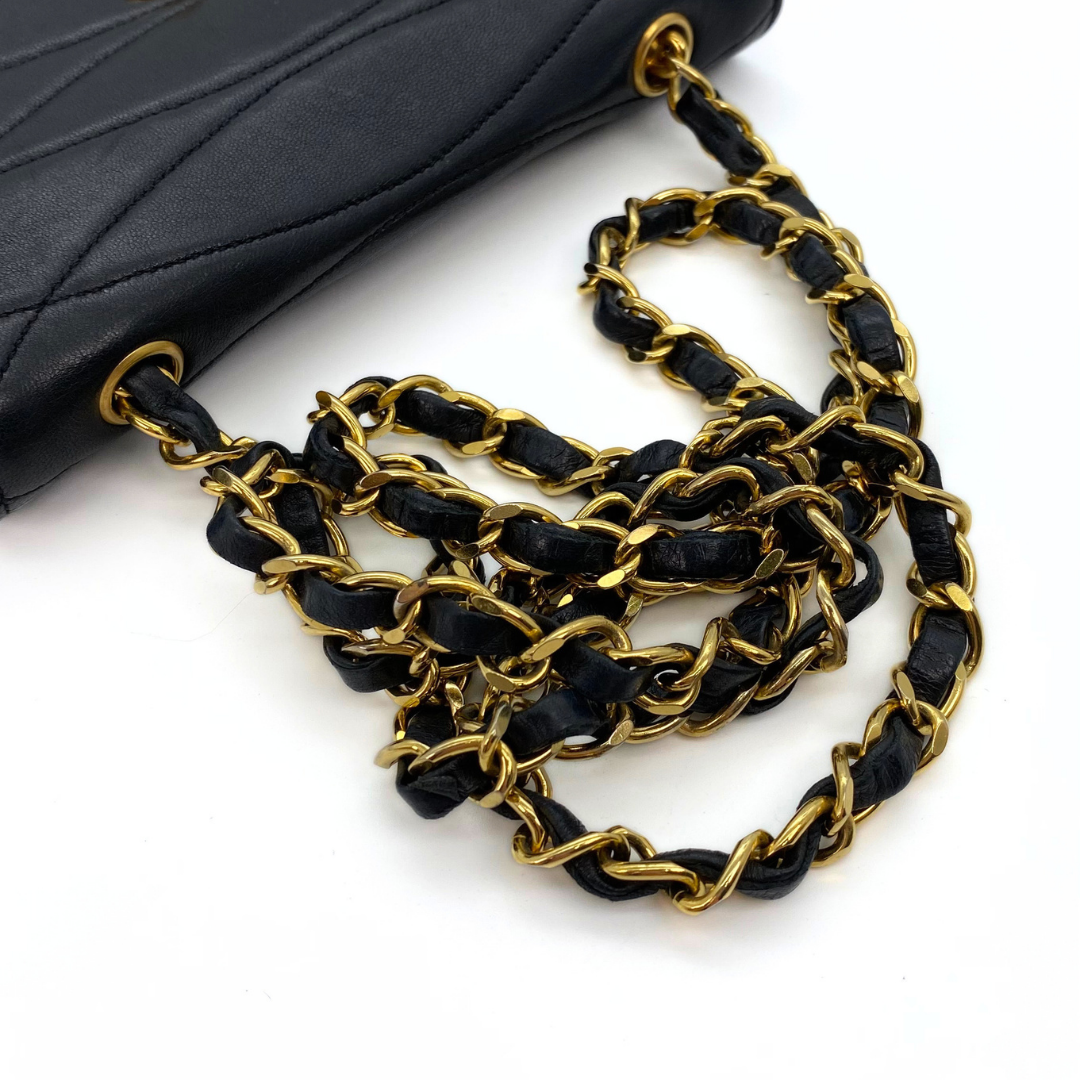 Xarena, 2 Series Curved Stitch Black Lambskin with seal and card
