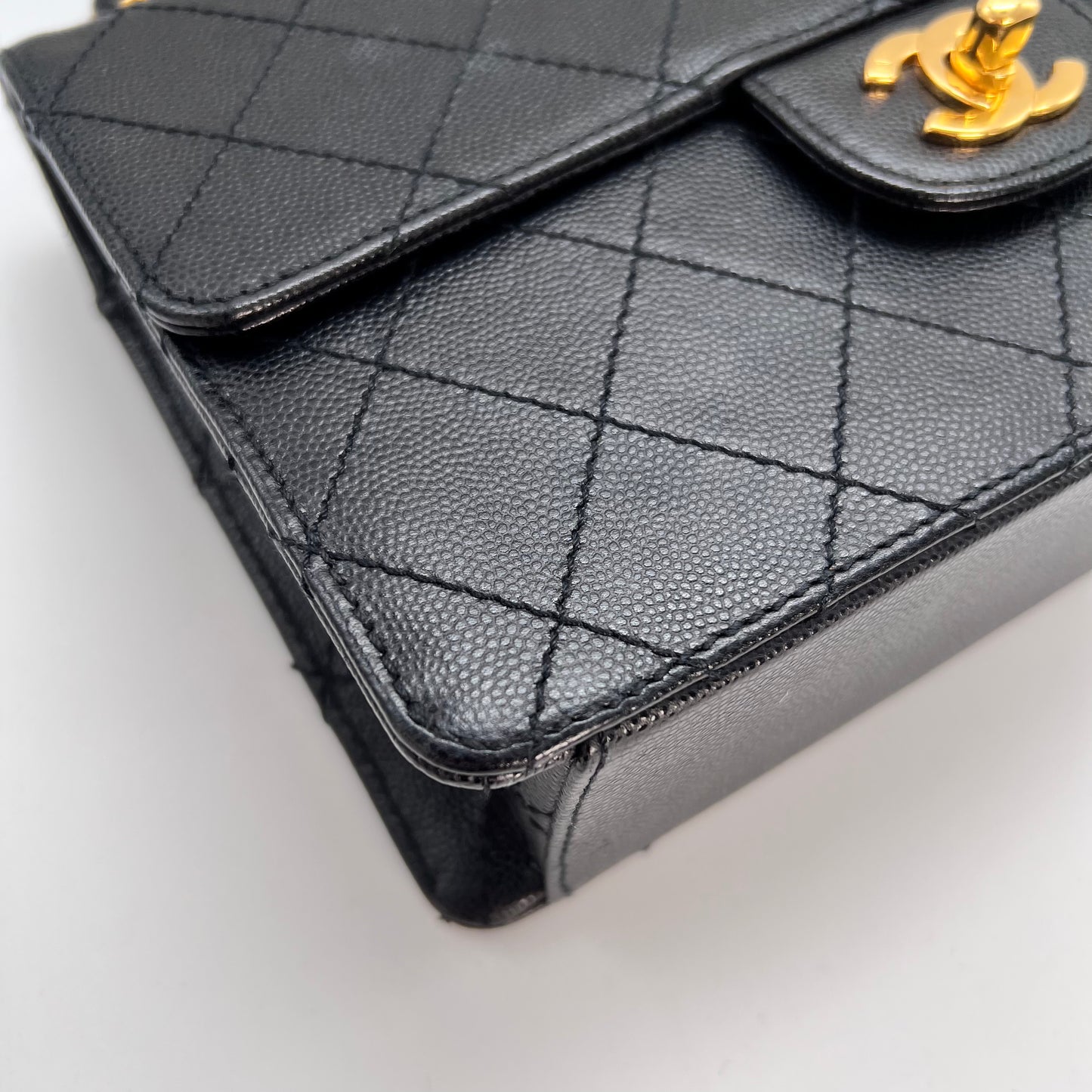 Cathy, Vintage Authentic Chanel 5 series chain wild stitch flap in black caviar with seal and card