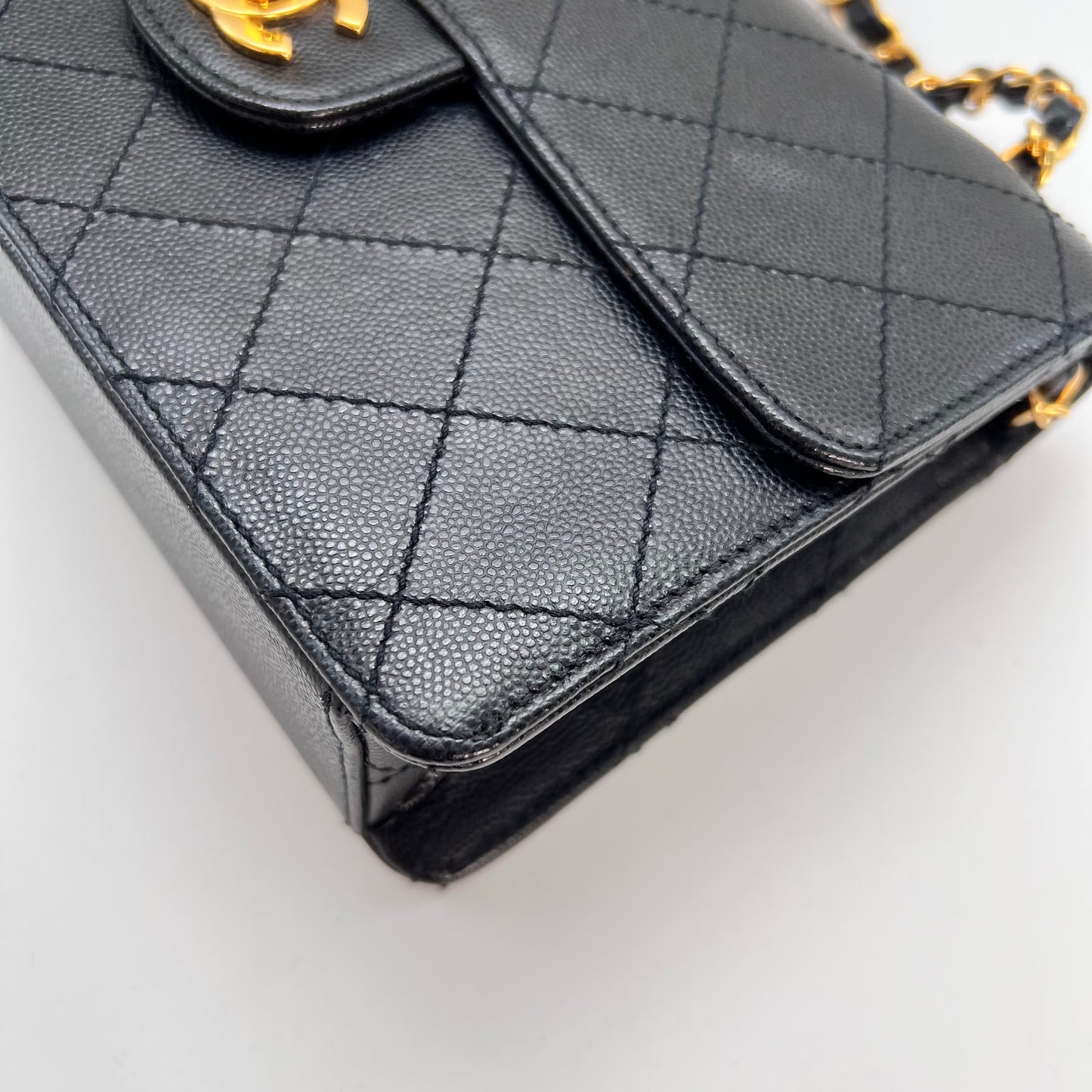 Cathy, Vintage Authentic Chanel 5 series chain wild stitch flap in black caviar with seal and card