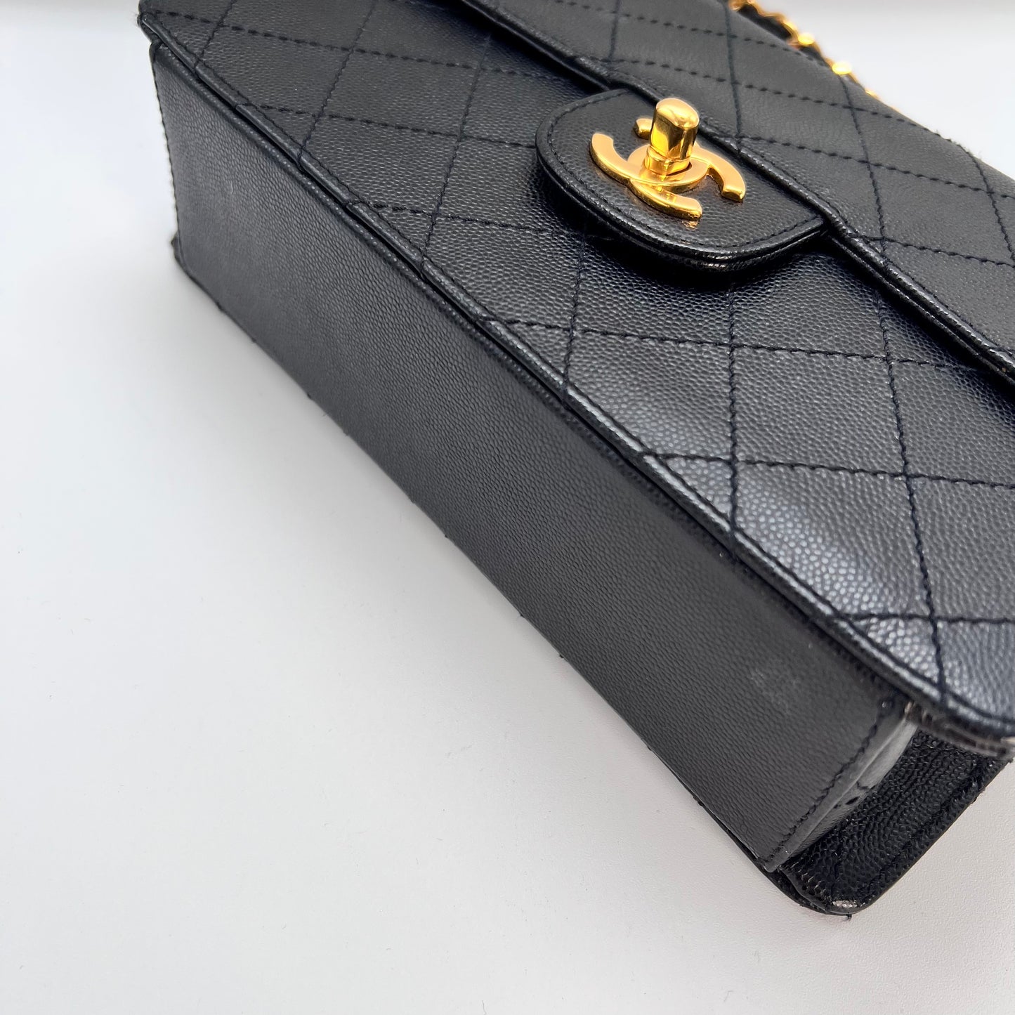 Cathy, Vintage Authentic Chanel 5 series chain wild stitch flap in black caviar with seal and card