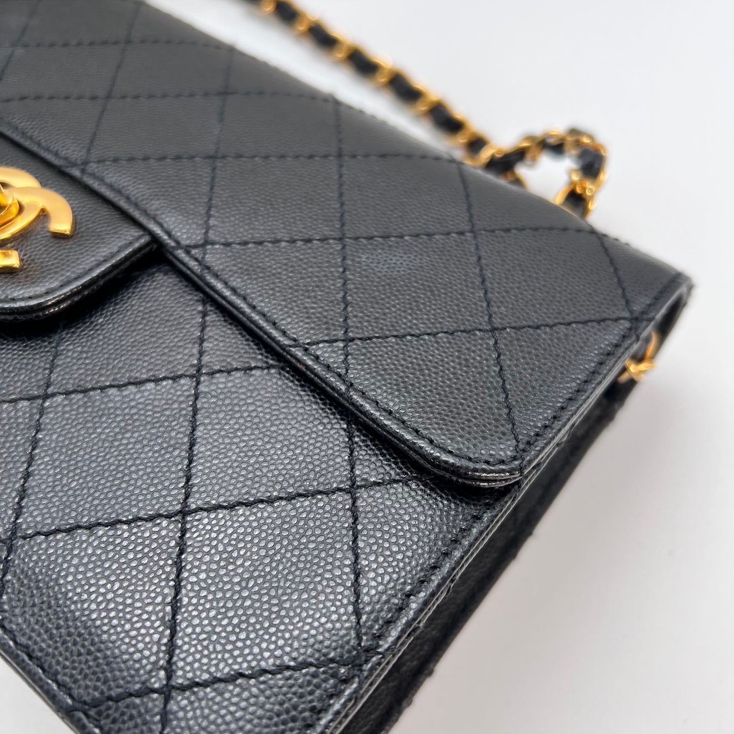 Cathy, Vintage Authentic Chanel 5 series chain wild stitch flap in black caviar with seal and card