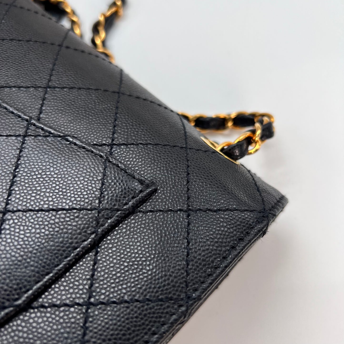 Cathy, Vintage Authentic Chanel 5 series chain wild stitch flap in black caviar with seal and card