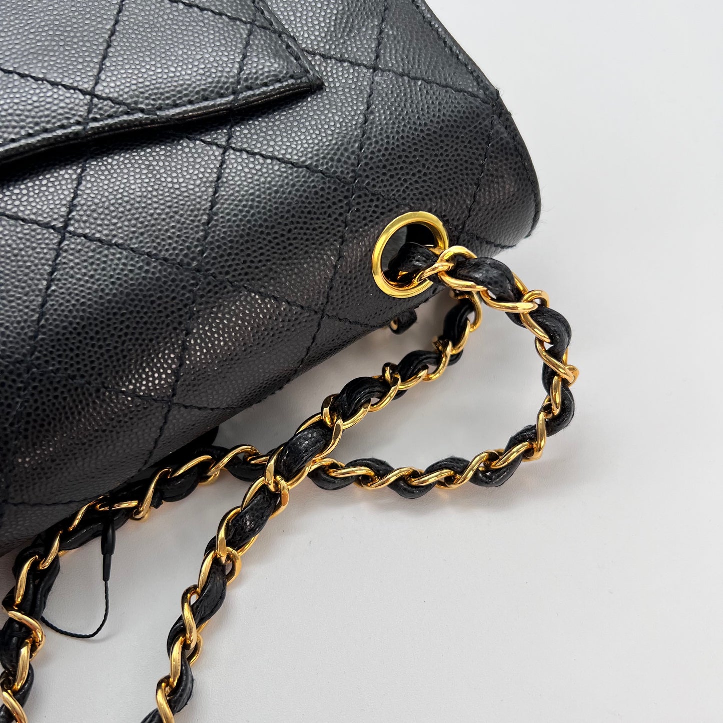 Cathy, Vintage Authentic Chanel 5 series chain wild stitch flap in black caviar with seal and card