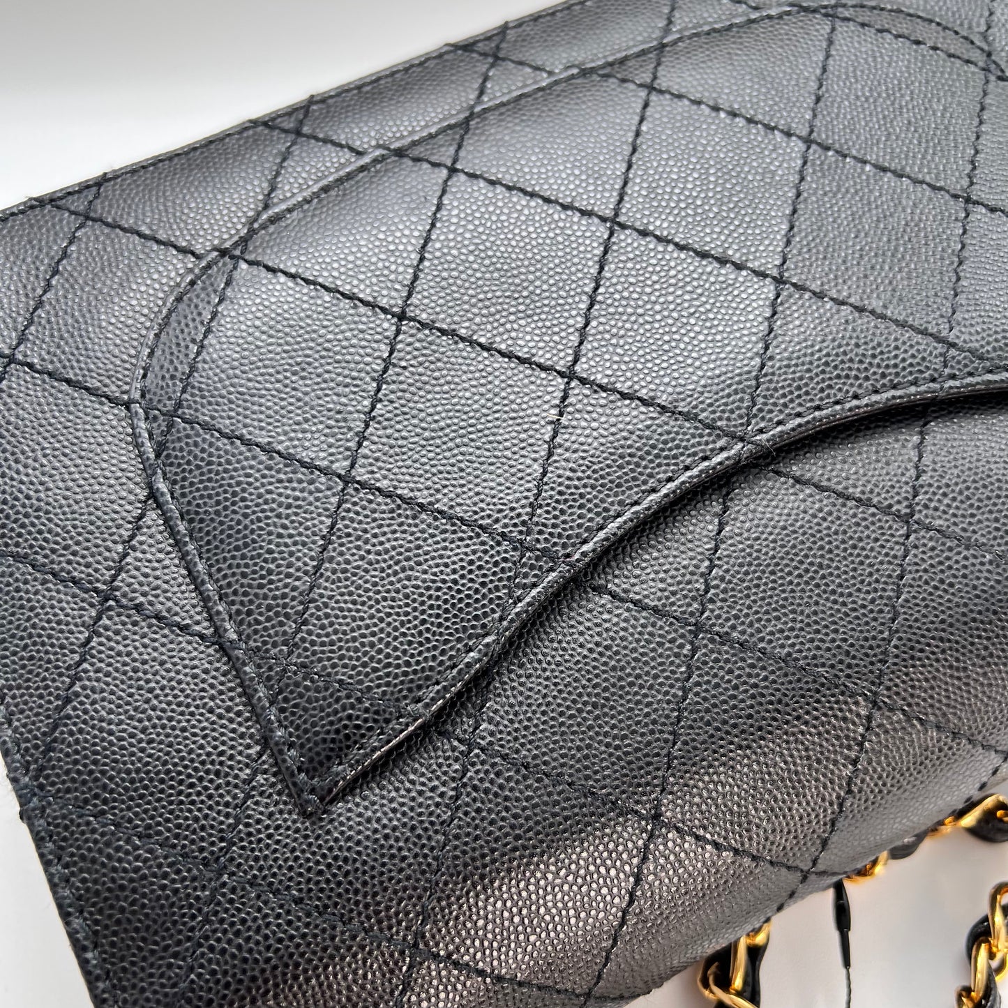 Cathy, Vintage Authentic Chanel 5 series chain wild stitch flap in black caviar with seal and card