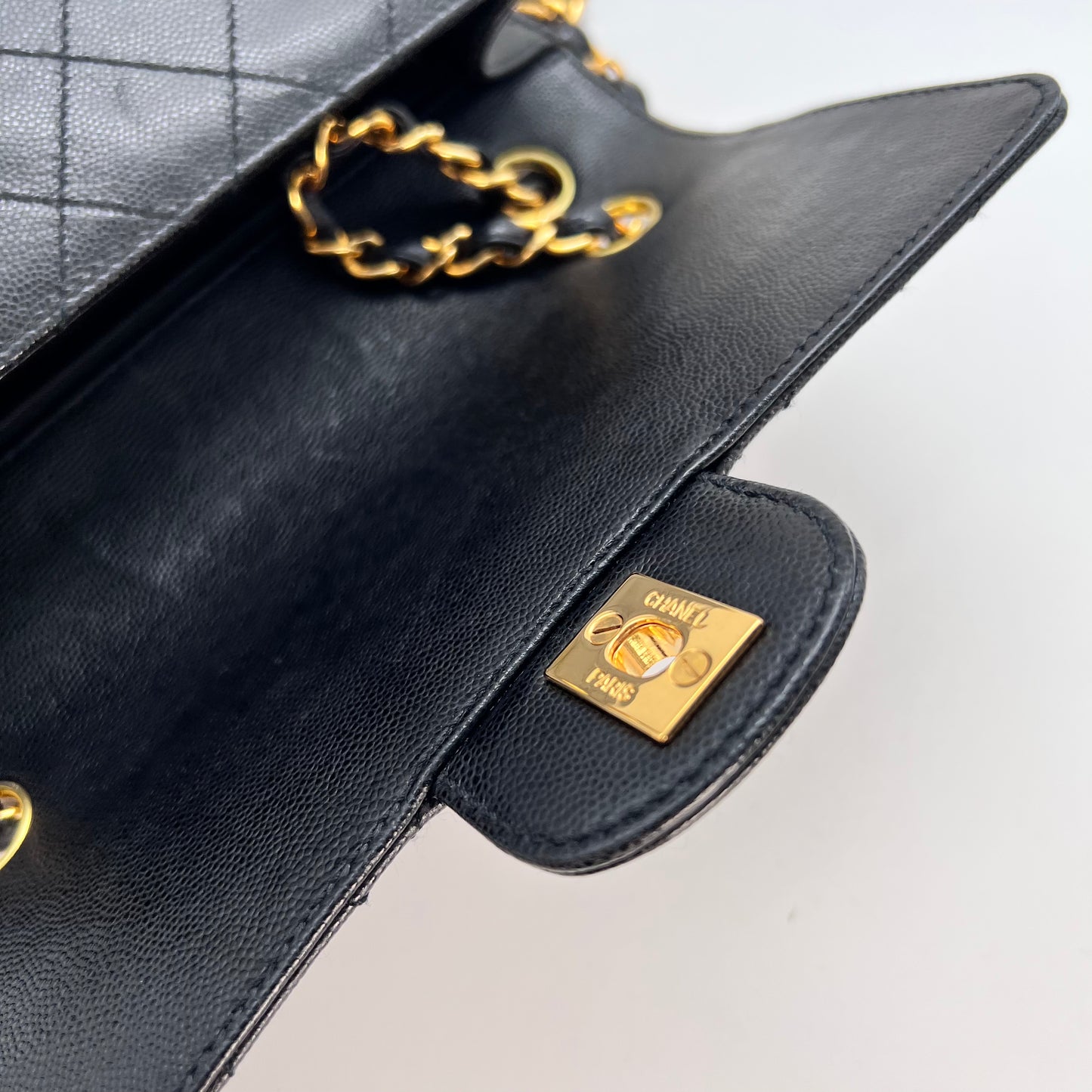 Cathy, Vintage Authentic Chanel 5 series chain wild stitch flap in black caviar with seal and card