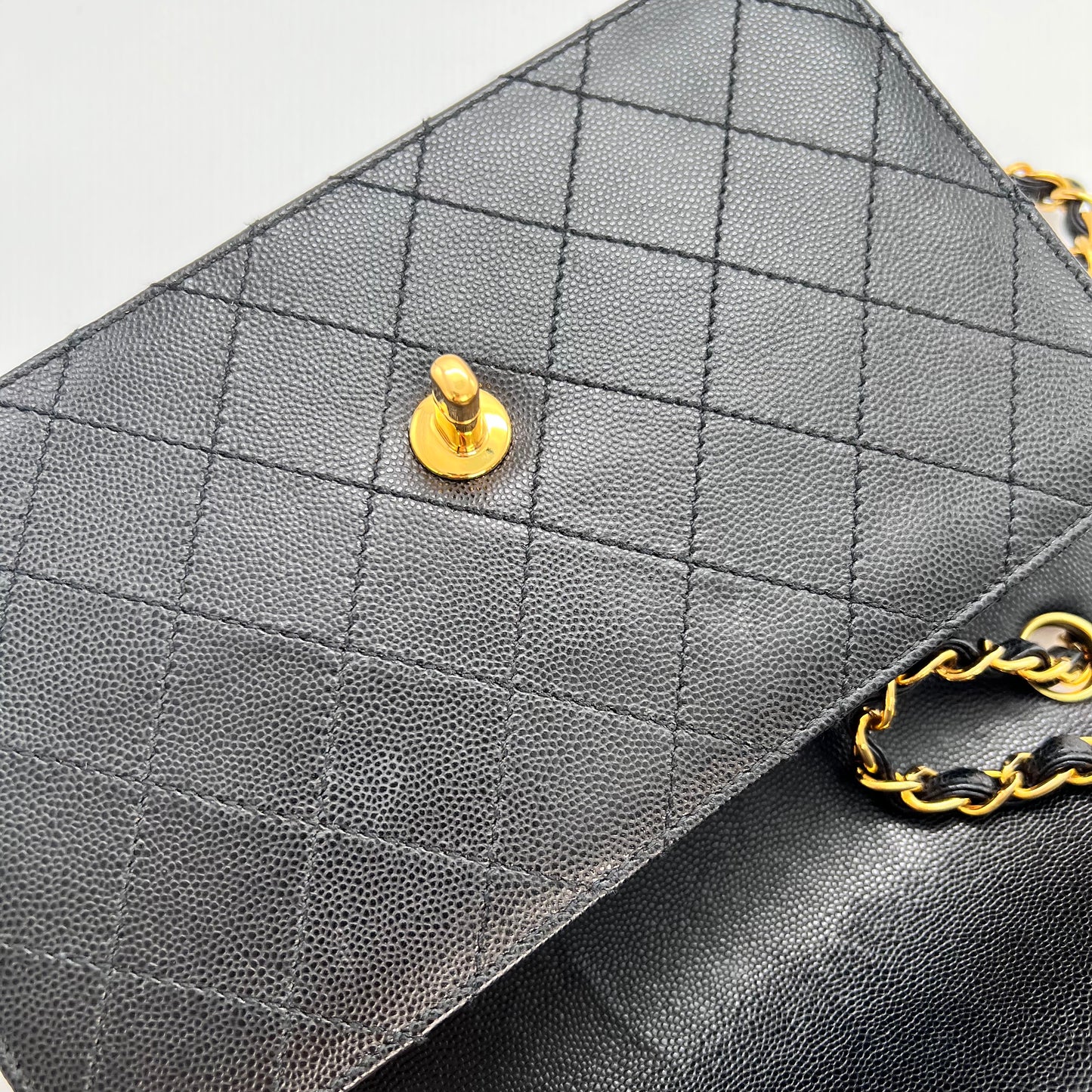 Cathy, Vintage Authentic Chanel 5 series chain wild stitch flap in black caviar with seal and card