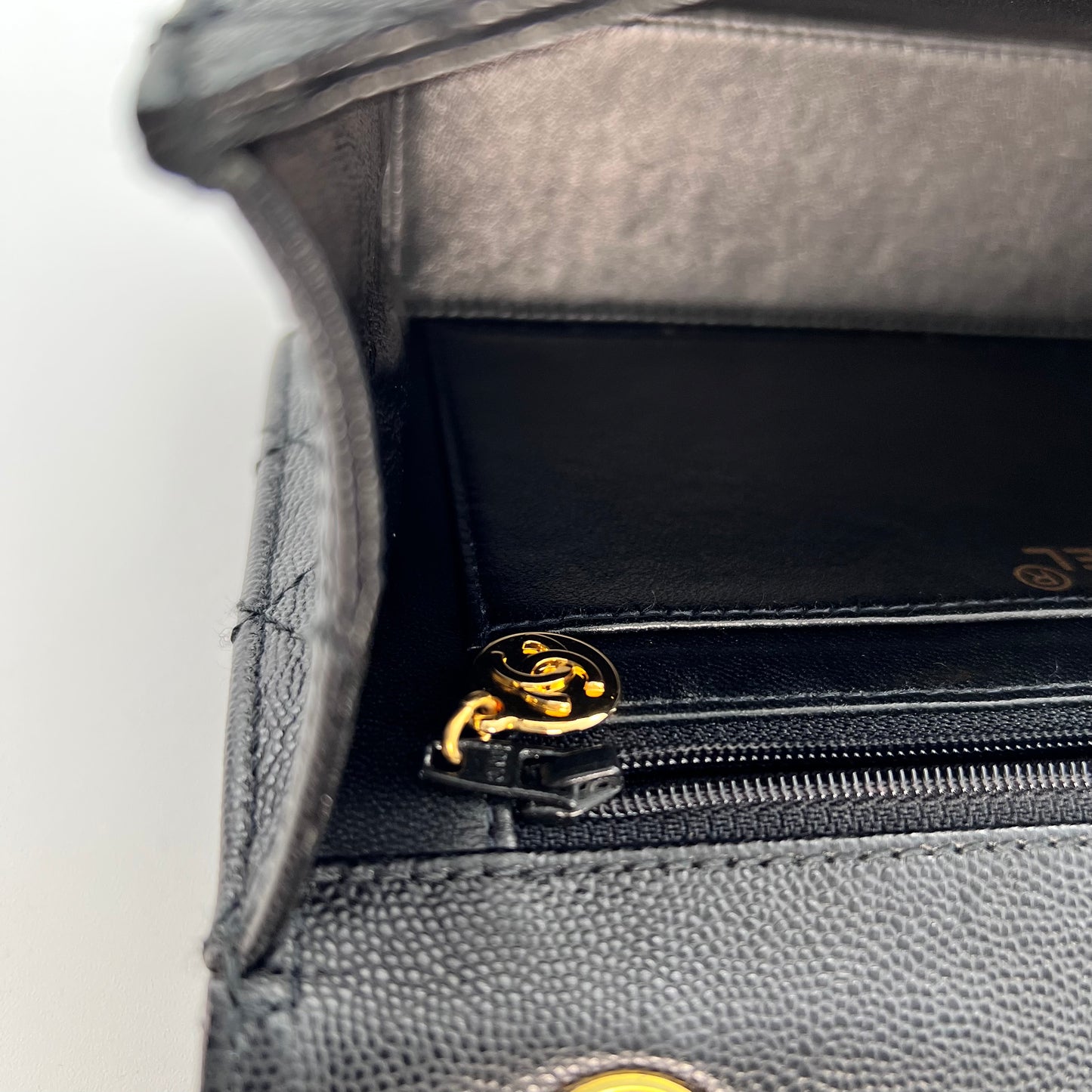 Cathy, Vintage Authentic Chanel 5 series chain wild stitch flap in black caviar with seal and card