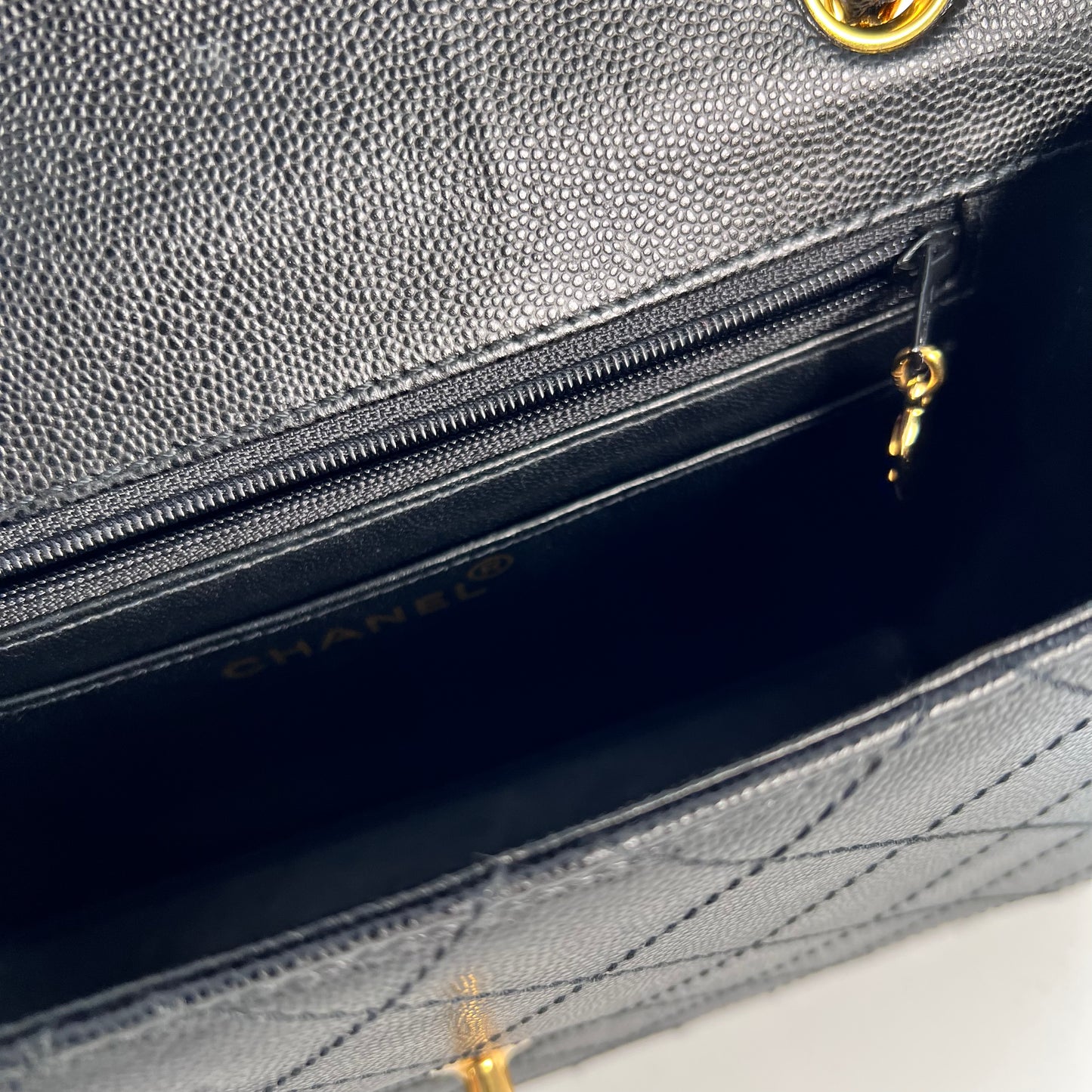 Cathy, Vintage Authentic Chanel 5 series chain wild stitch flap in black caviar with seal and card