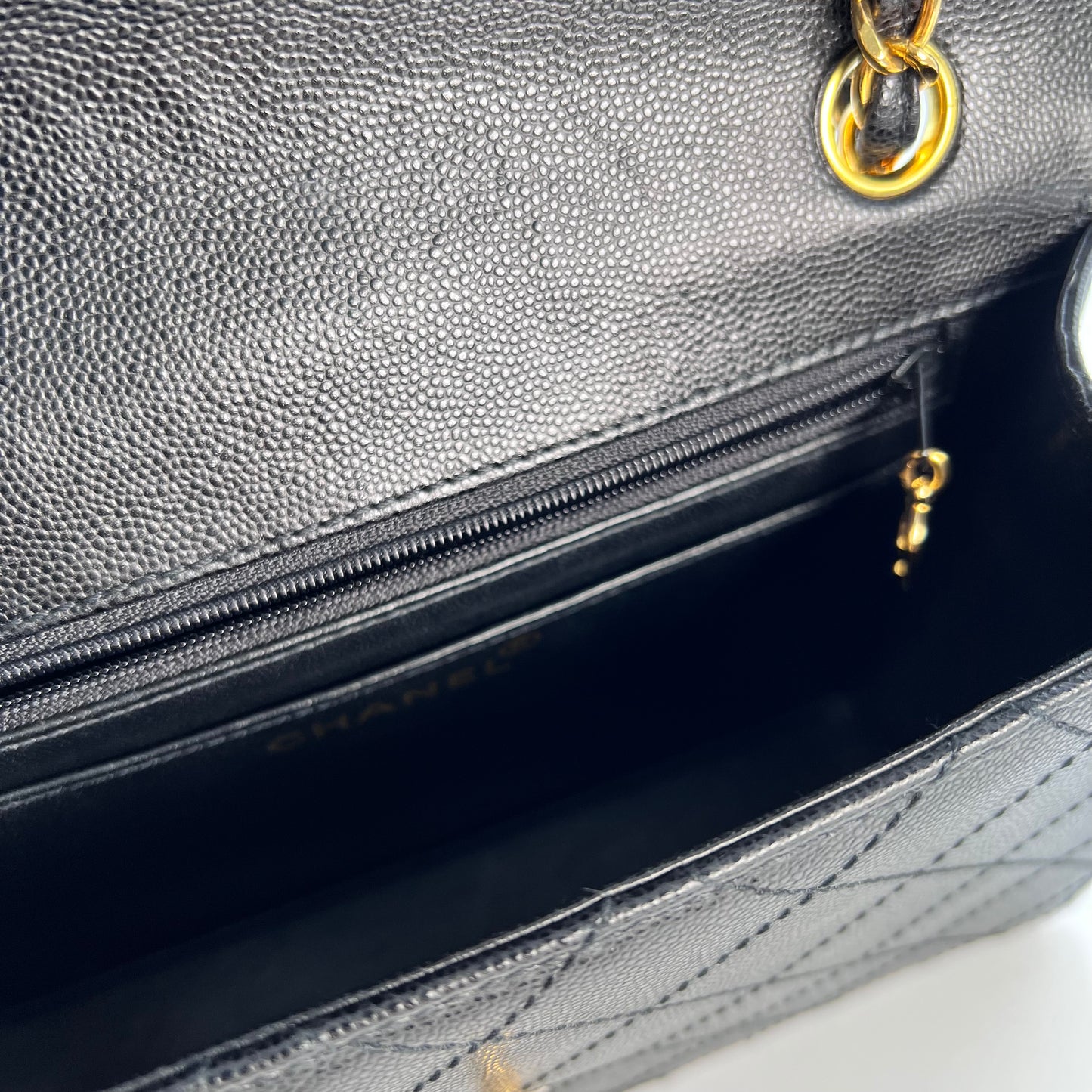 Cathy, Vintage Authentic Chanel 5 series chain wild stitch flap in black caviar with seal and card