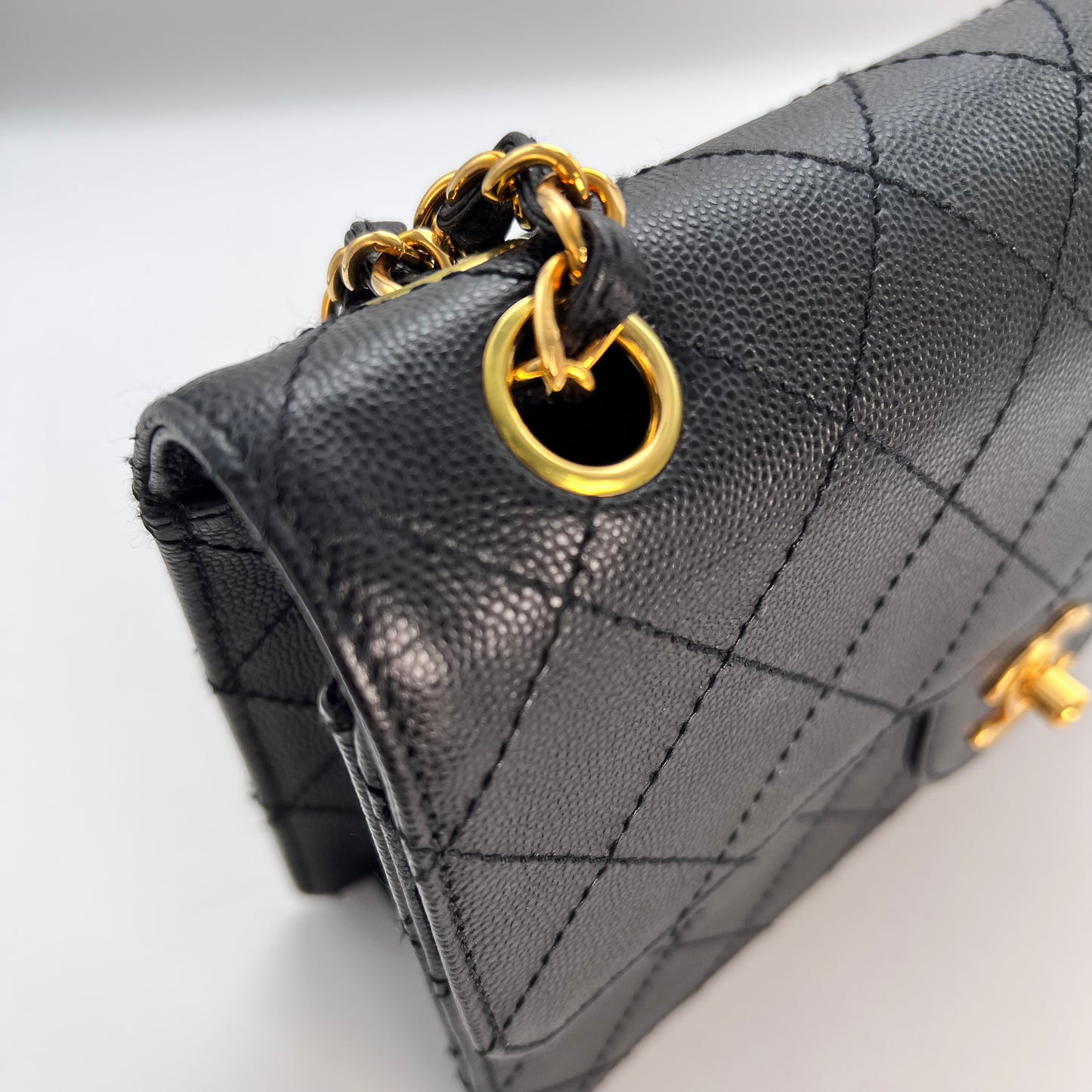 Cathy, Vintage Authentic Chanel 5 series chain wild stitch flap in black caviar with seal and card