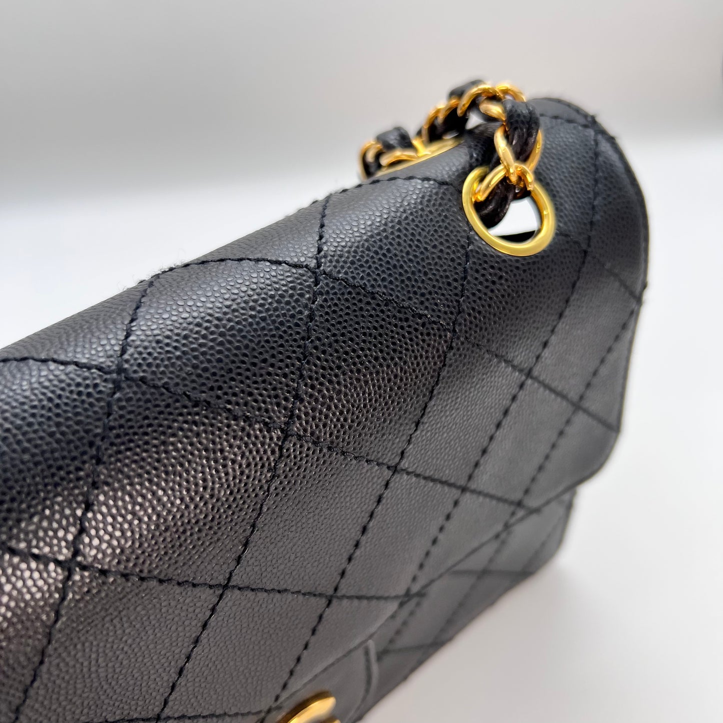 Cathy, Vintage Authentic Chanel 5 series chain wild stitch flap in black caviar with seal and card