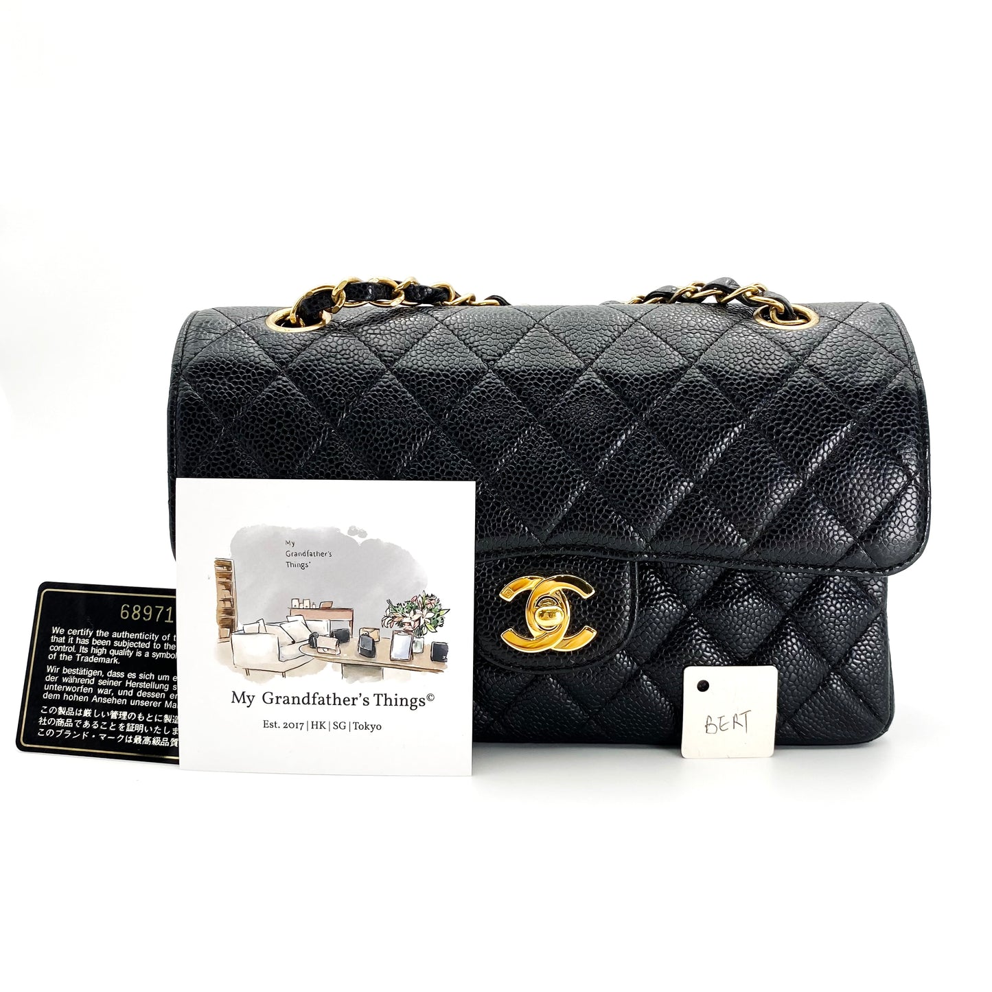 Bert, Vintage Authentic Chanel 6 series small classic flap black caviar with seal and card