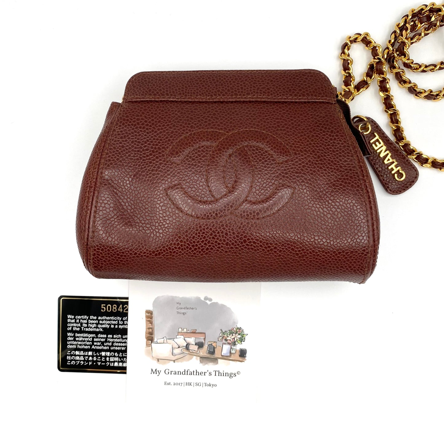 Eljayne, Vintage Authentic Chanel 5 series mini brown caviar "dumpling" with seal and card