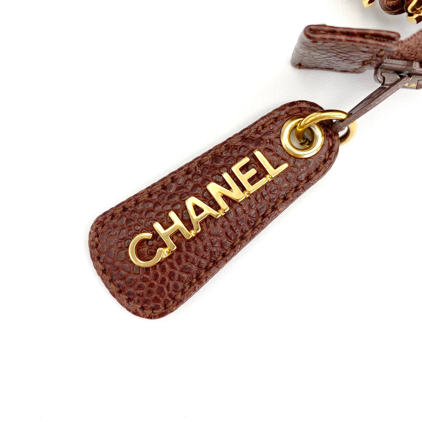Eljayne, Vintage Authentic Chanel 5 series mini brown caviar "dumpling" with seal and card