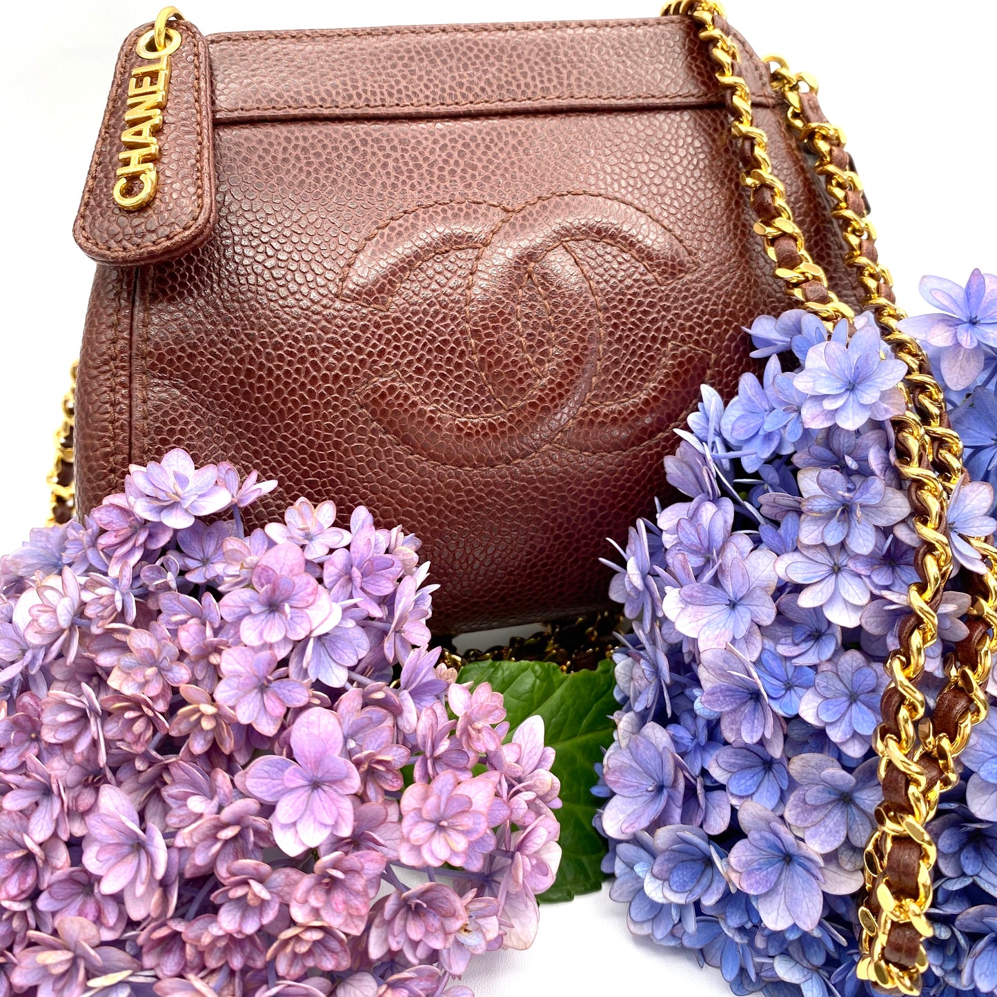 Eljayne, Vintage Authentic Chanel 5 series mini brown caviar "dumpling" with seal and card