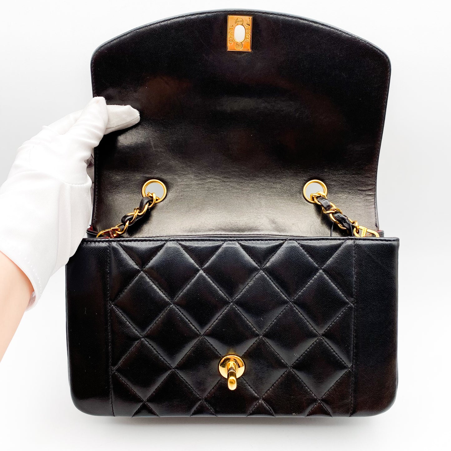 Theodoro, Vintage Authentic Chanel 2 series small black lambskin diana with seal and card