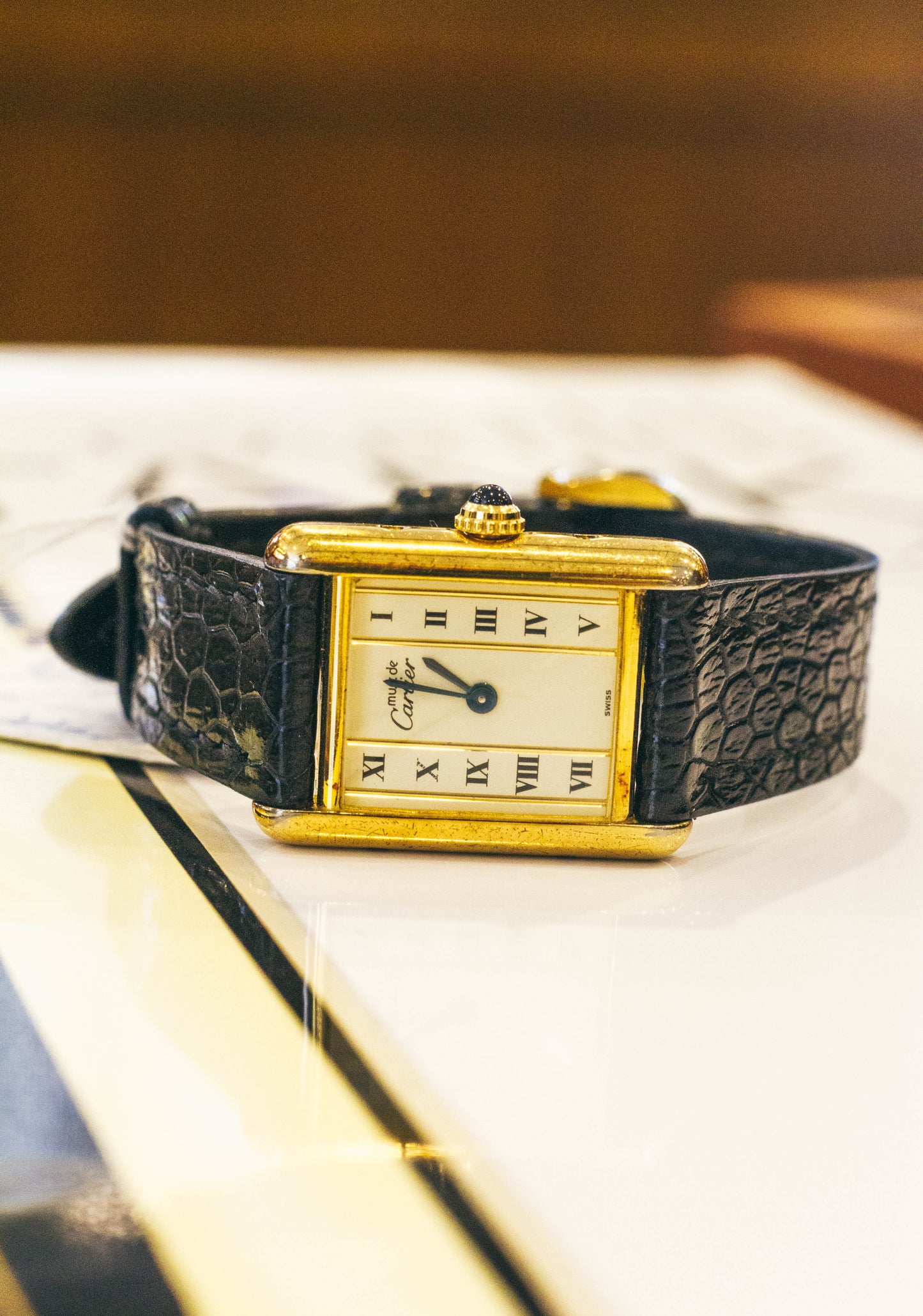 Enigma, Vintage Authentic Cartier 1980-1990's tank vermeil 925 gold plated column white roman dial with gold lapted pin buckle
