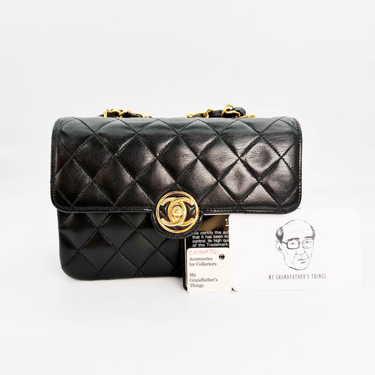 Chinatsu, Vintage Authentic Chanel 1 series mini matelasse black lambskin with seal and card