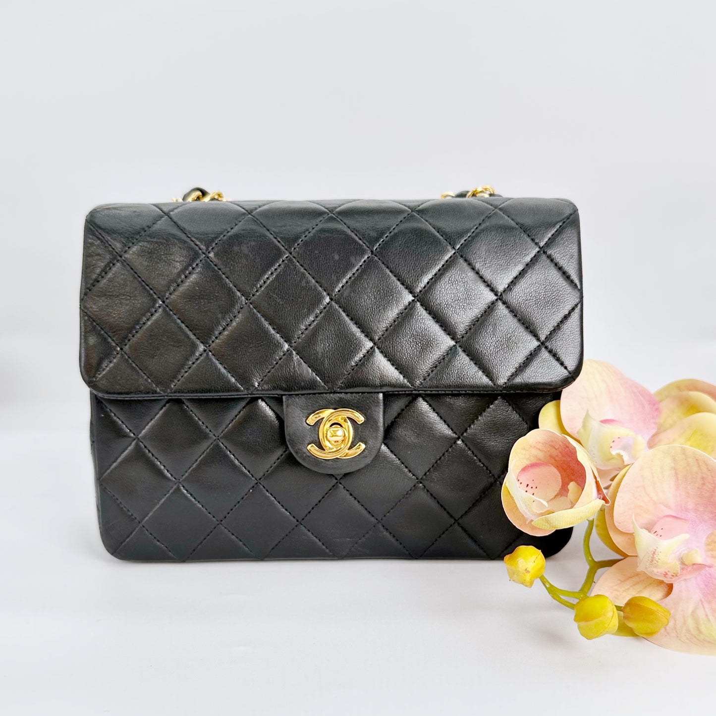 Keira, Vintage Authentic Chanel 1 series 20cm square mini black lambskin with seal and card