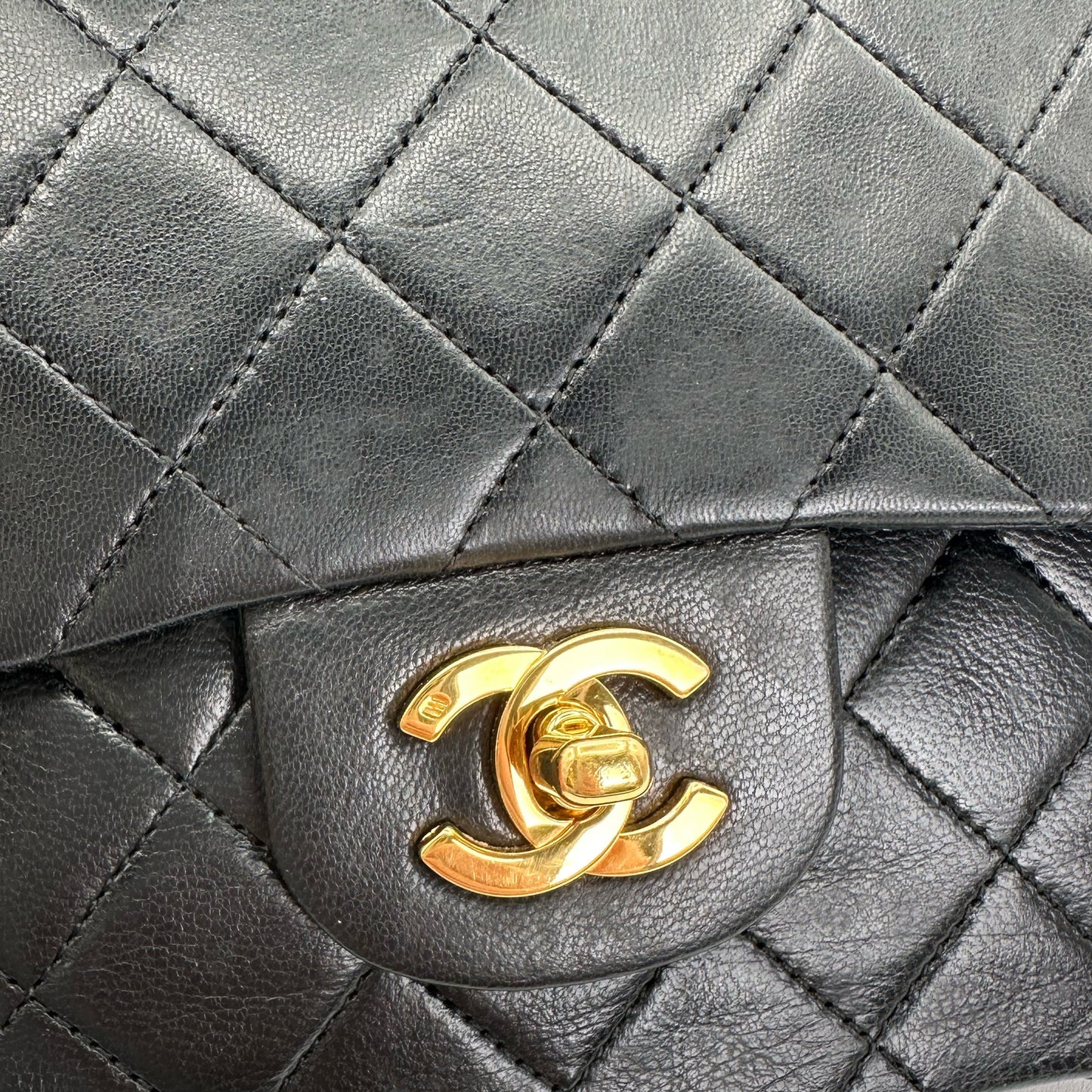 Coleman, Vintage Authentic Chanel 1 series small classic flap black lambskin with seal and card