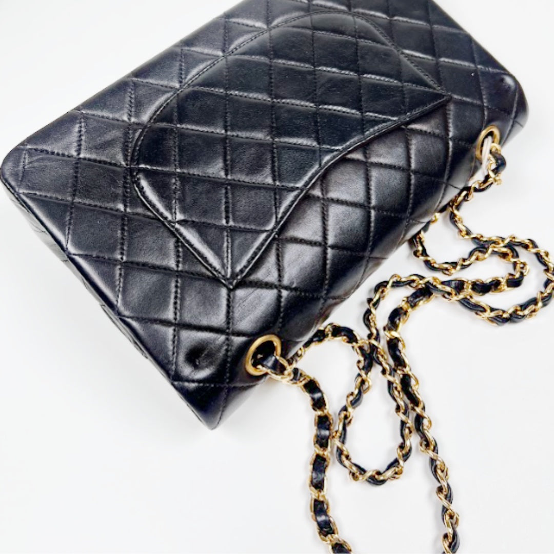 Ingrid, Vintage Authentic Chanel 6 series medium classic flap black lambskin with seal and card