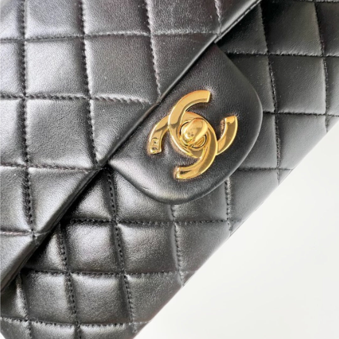 Ingrid, Vintage Authentic Chanel 6 series medium classic flap black lambskin with seal and card