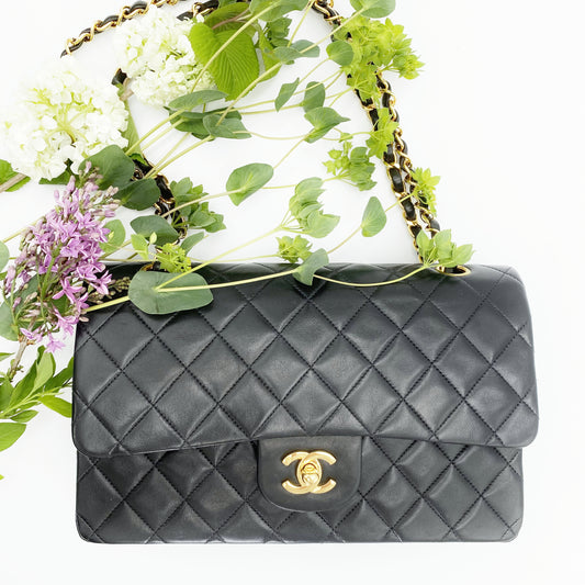 Krista, Vintage Authentic Chanel 5 series medium black classic flap lambskin with seal and card