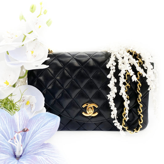 Julio, Vintage Authentic Chanel 1 series matelasse half moon chain black lambskin with seal and card