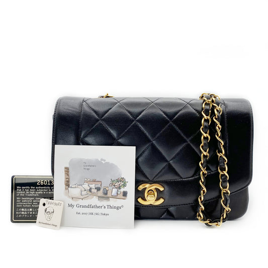 Theodoro, Vintage Authentic Chanel 2 series small black lambskin diana with seal and card