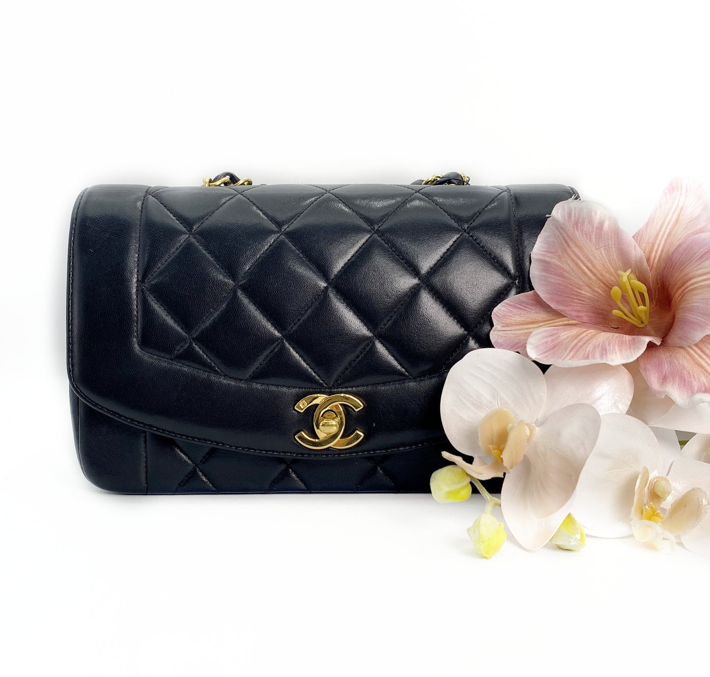 Miranda Sr, Vintage Authentic Chanel 2 series small black lambskin diana with seal only