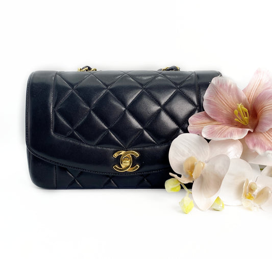 Miranda Sr, Vintage Authentic Chanel 2 series small black lambskin diana with seal only