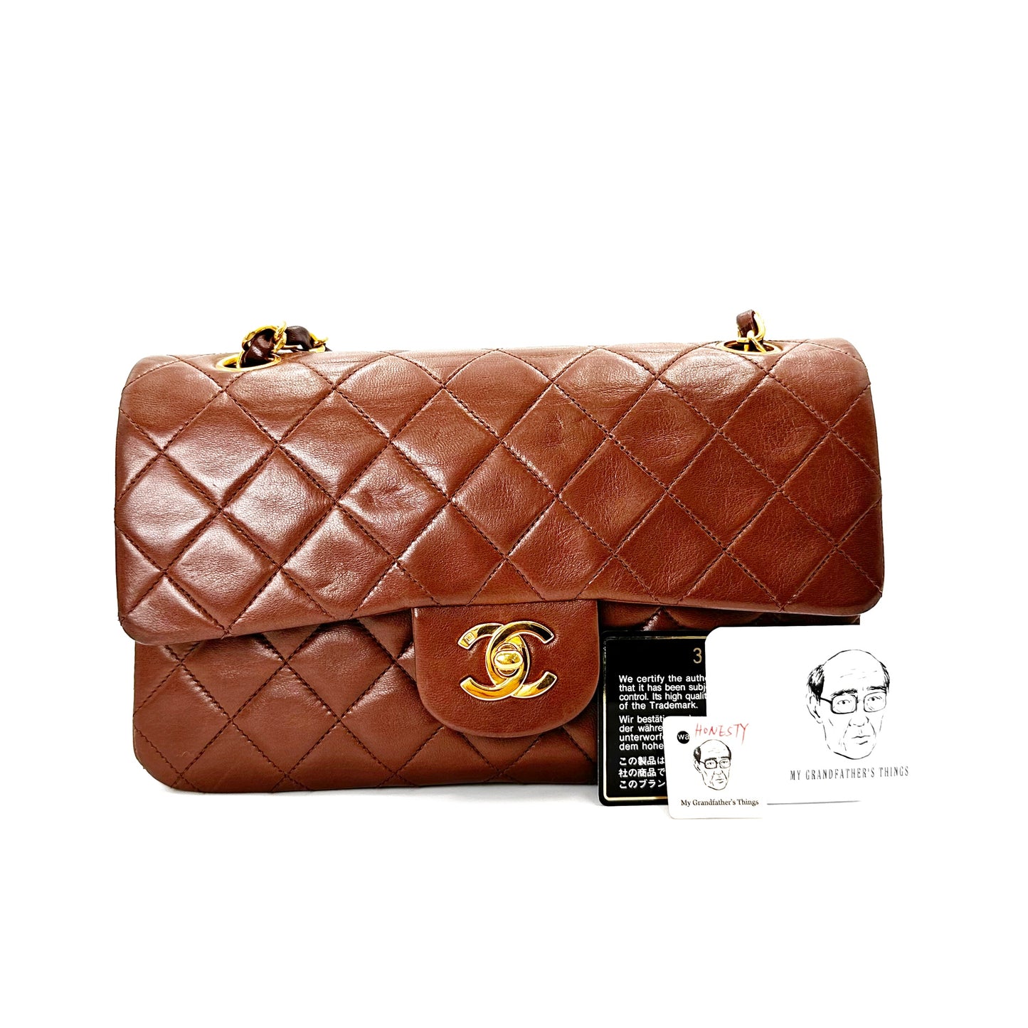 Honesty, Vintage Authentic Chanel 3 series small classic flap caramel lambskin with seal and card