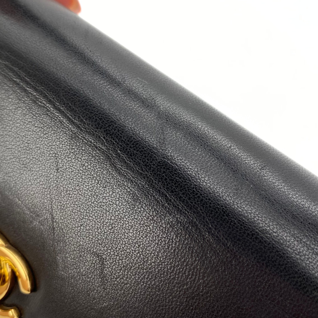 Makoto, 4 Series Turnlock Black Lambskin with seal and card